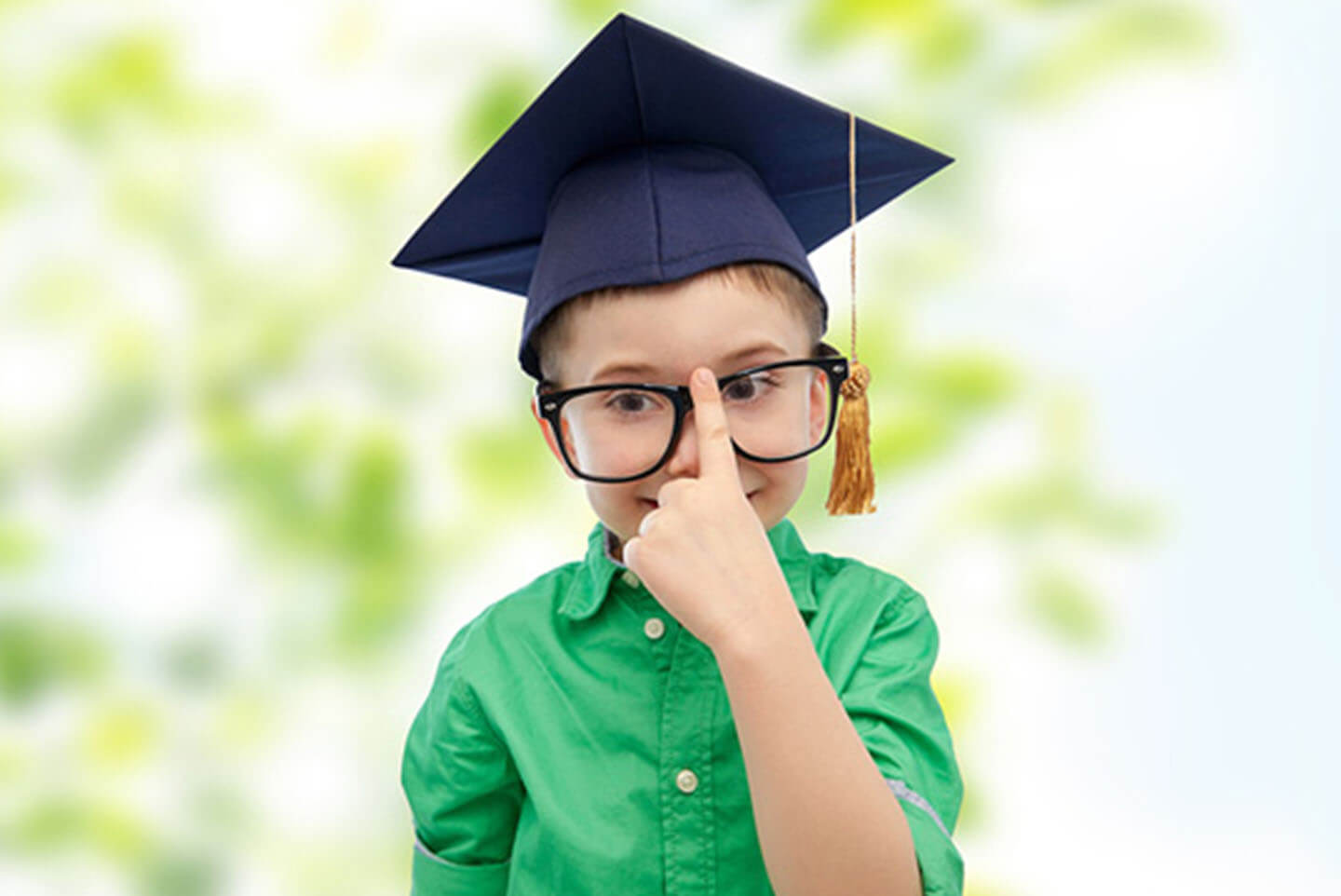 child in a Square academic cap