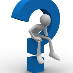 T.