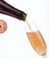 Botella y copa de champagne