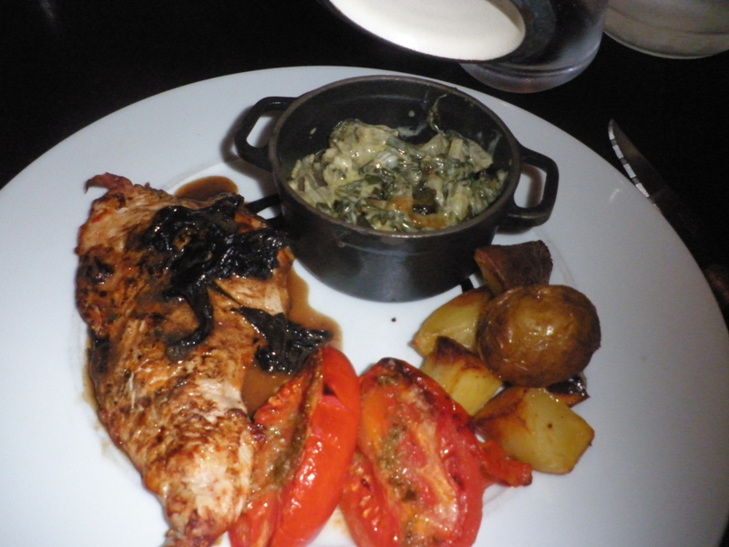 Restaurante La Genestière Escalopa de pavo a la brasa con salsa de setas