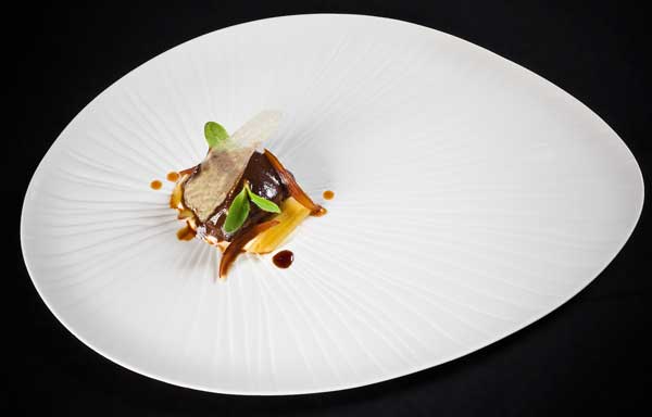 Lamprea con vino tinto jengibre