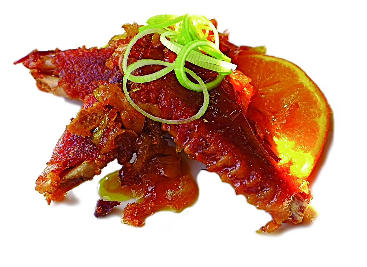 Alitas de pato lacadas en salsa de naranja