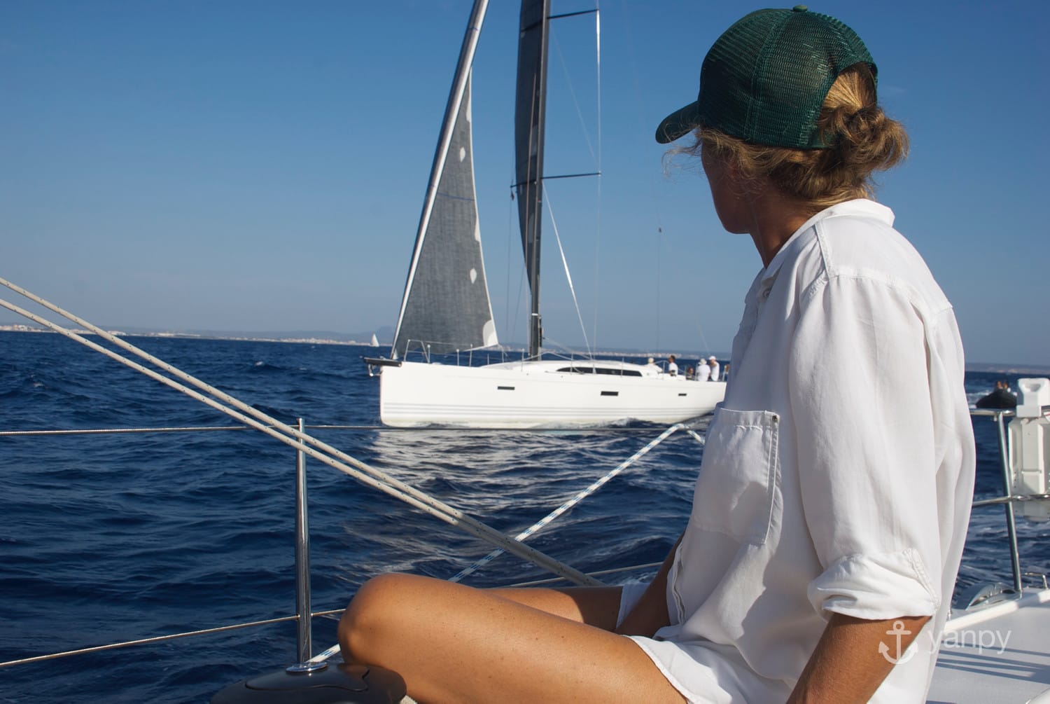 Woman sailing a boat in Majorca