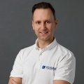 mgr Damian Flisak