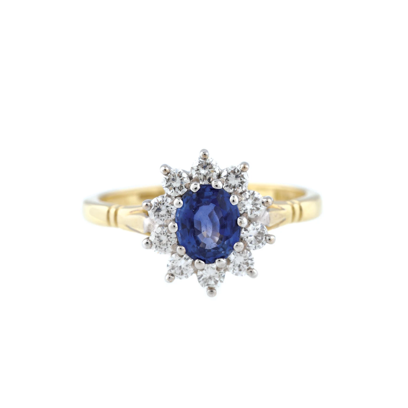 Inel din aur, decorat cu safir anturat de diamante
