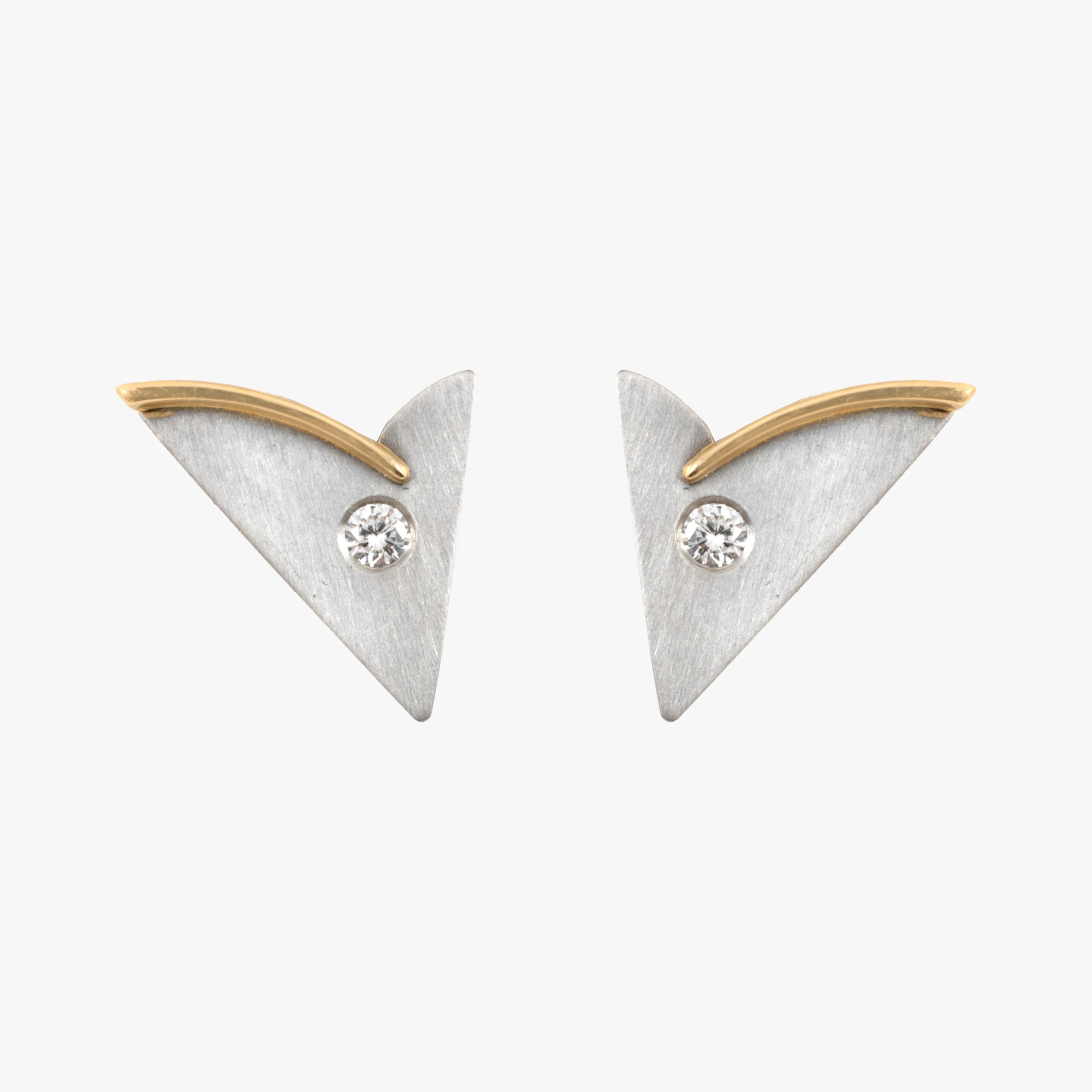 Pair of platinum and gold earrings decorated with diamonds