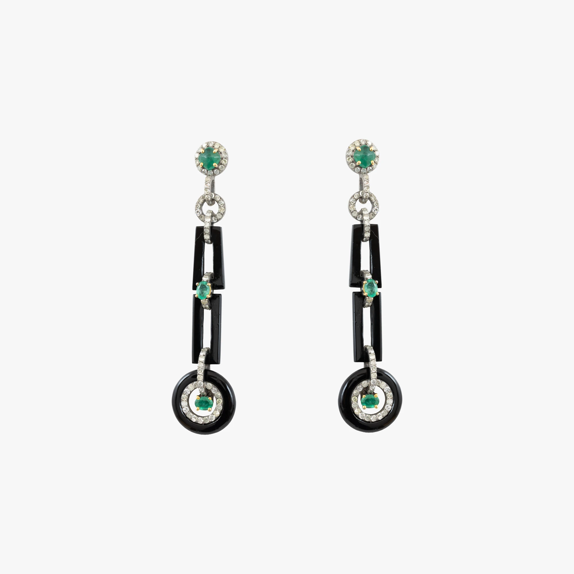 Pair of silver earrings decorated with emeralds, diamonds, and onyx