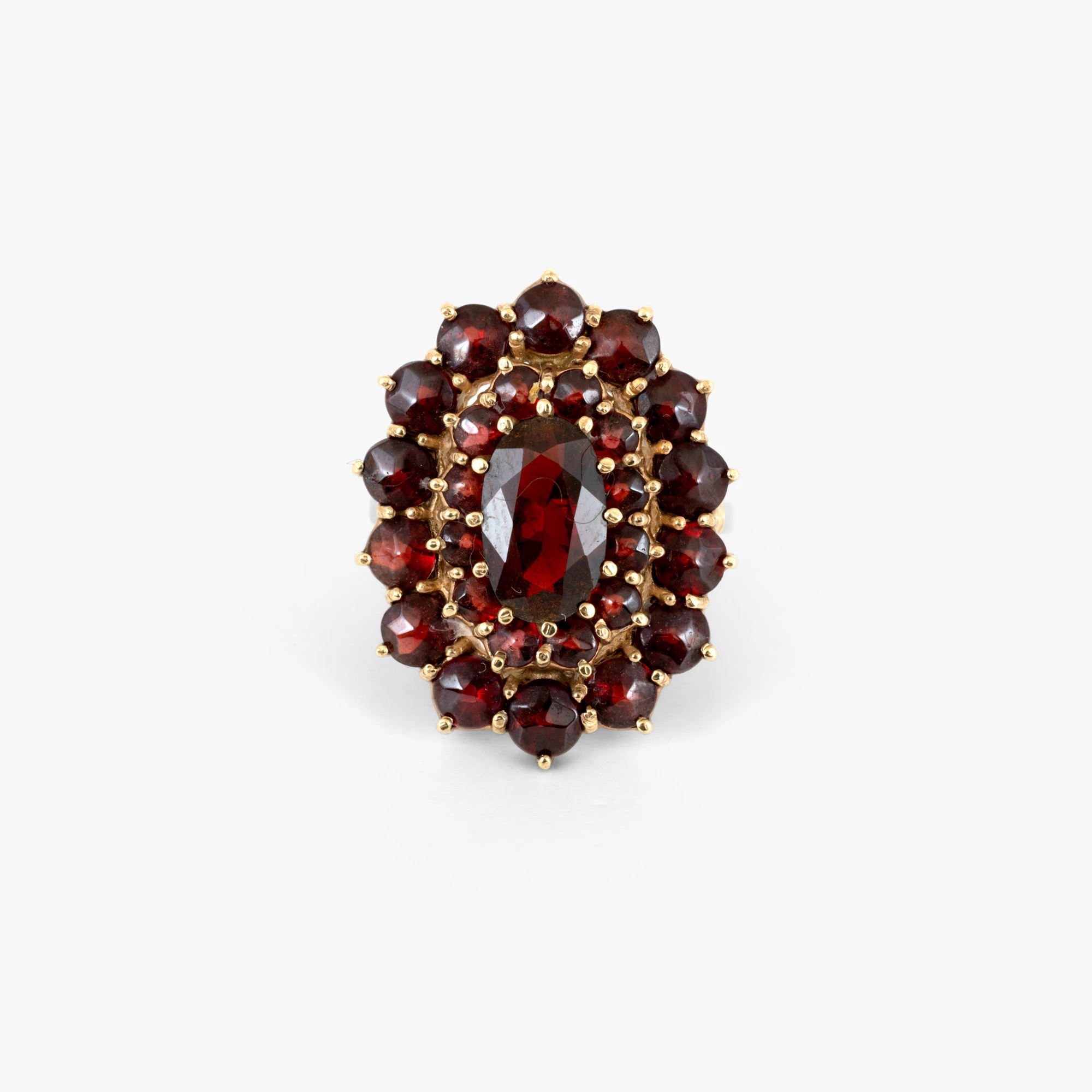 Gold ring decorated with garnets