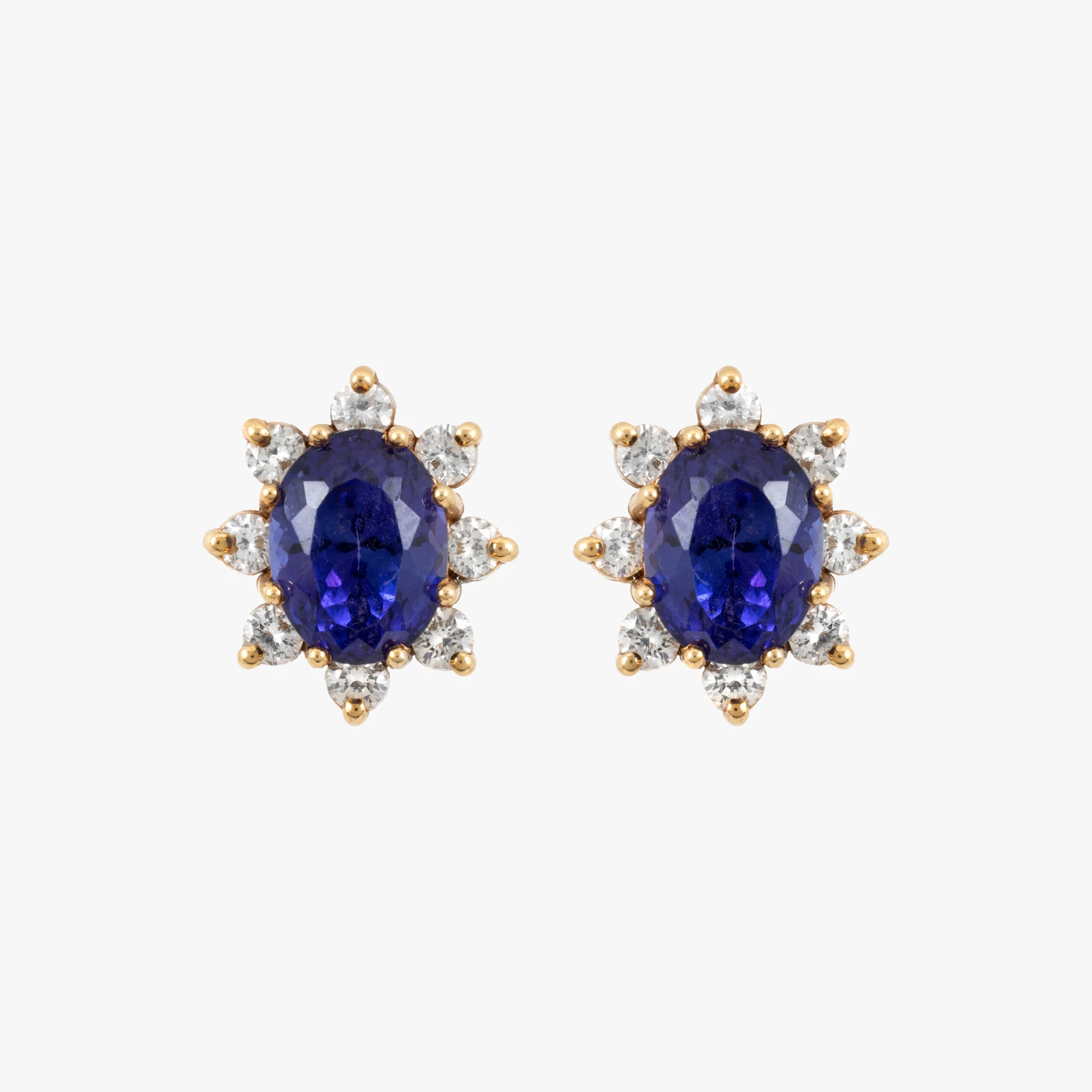 Pair of gold earrings decorated with tanzanite and diamonds