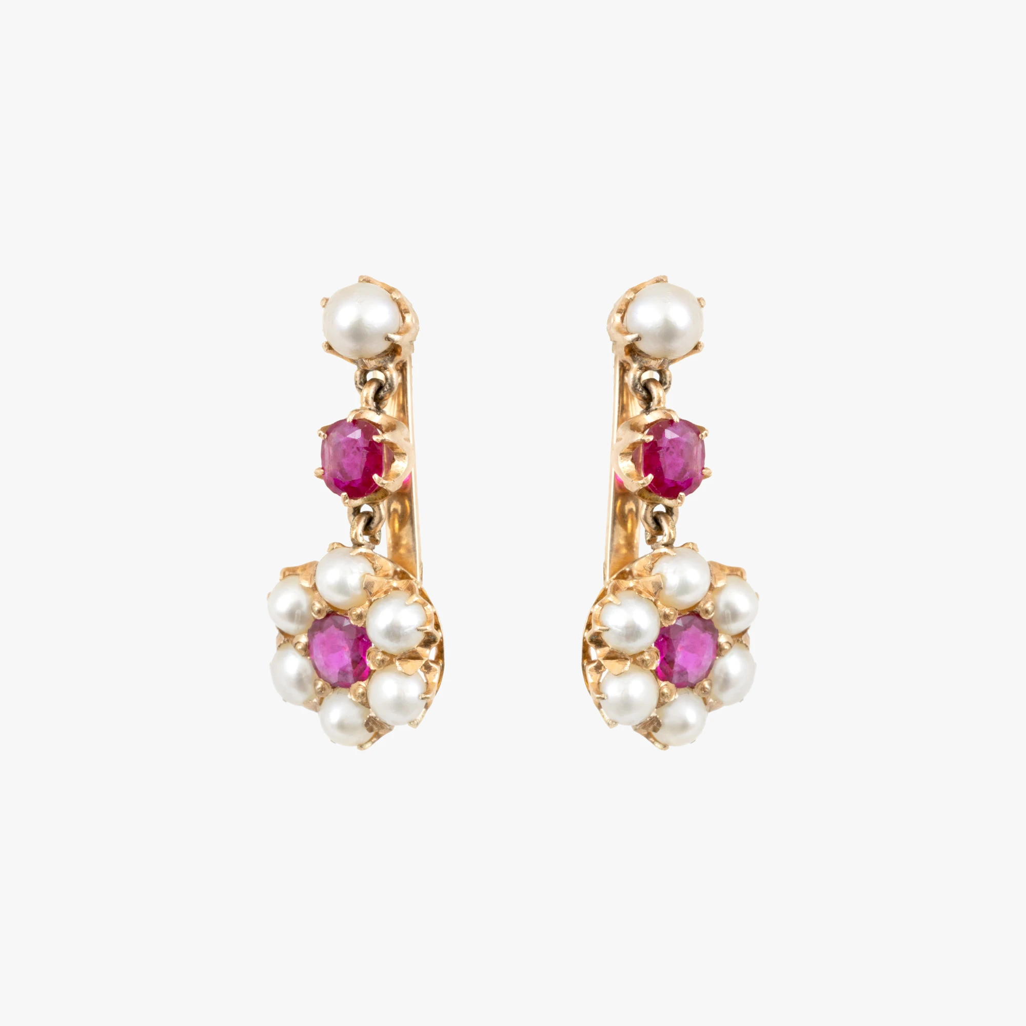 Pair of gold earrings in the shape of a flower, decorated with rubies and pearls
