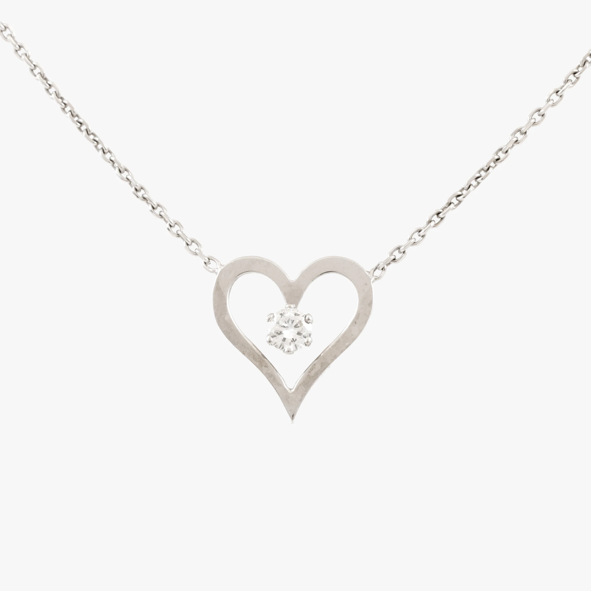 White gold chain with a heart-shaped pendant