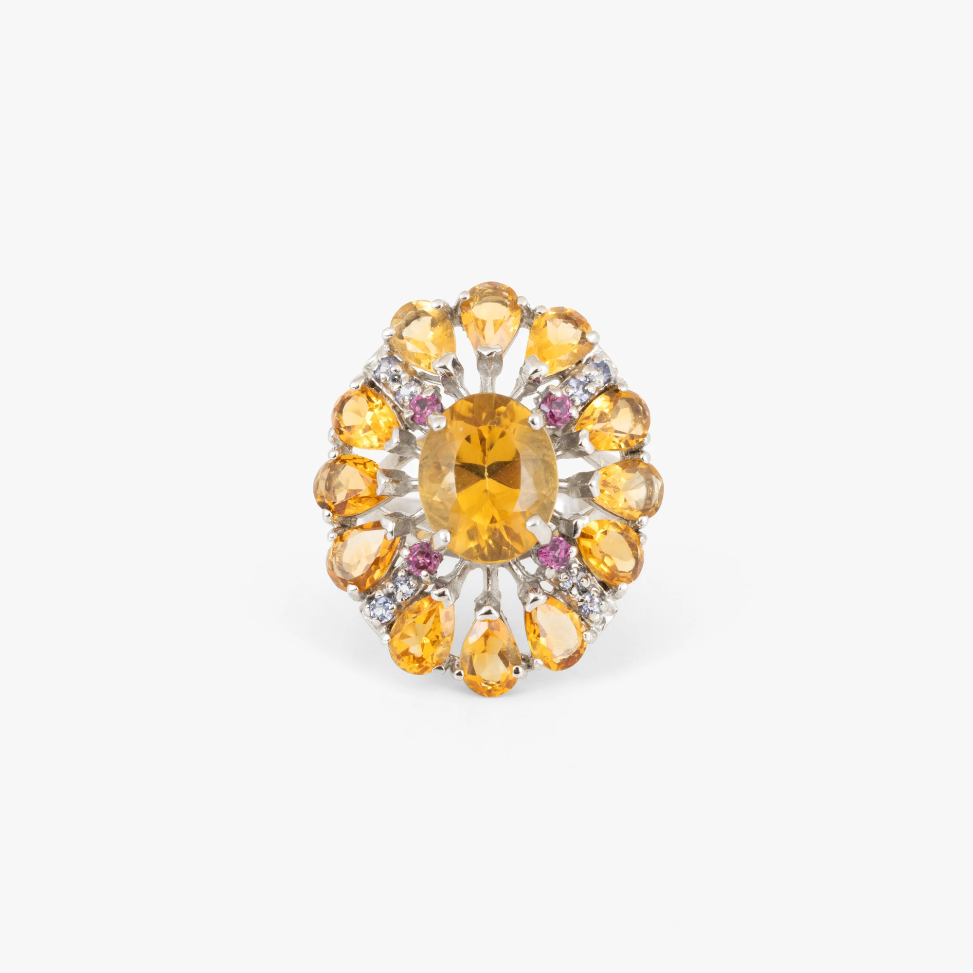 Silver ring decorated with citrines and sapphires