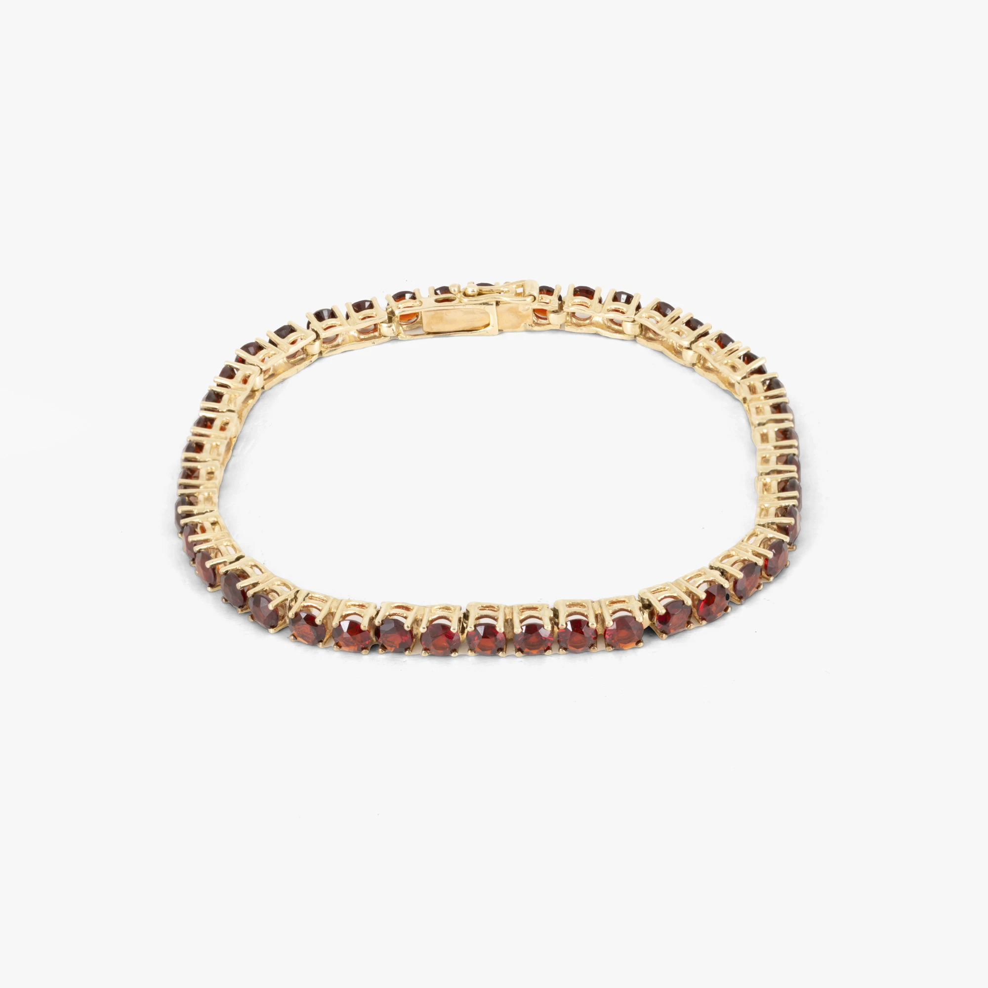 Gold bracelet decorated with garnets