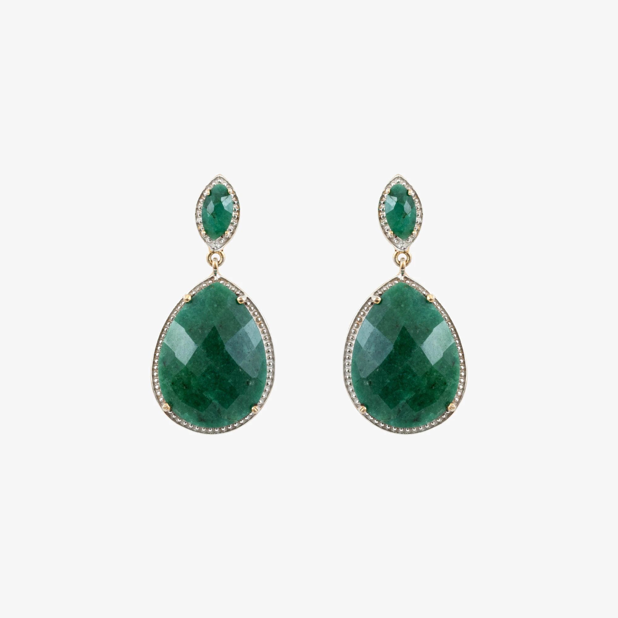 Pair of silver earrings decorated with emeralds