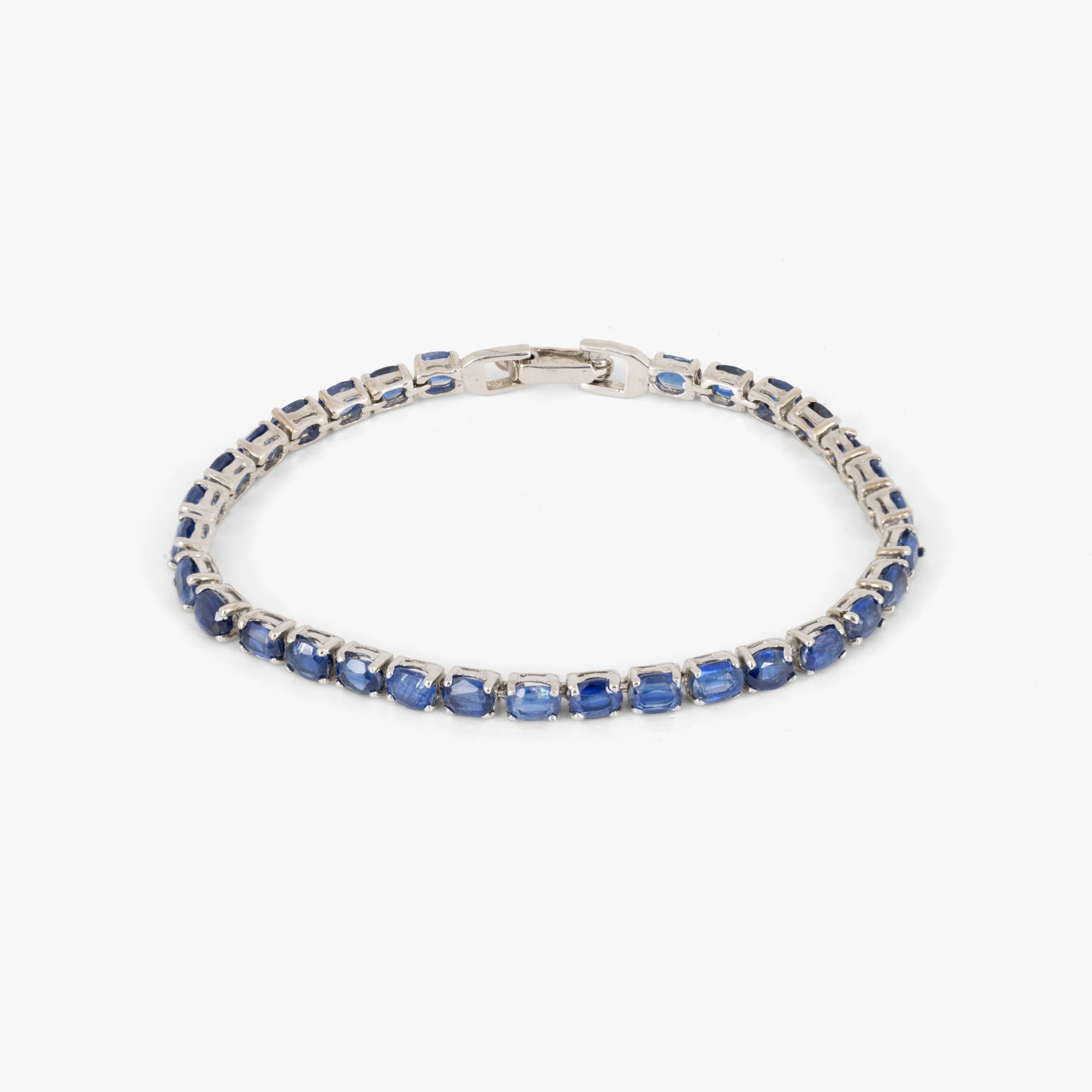 Silver bracelet decorated with iolite