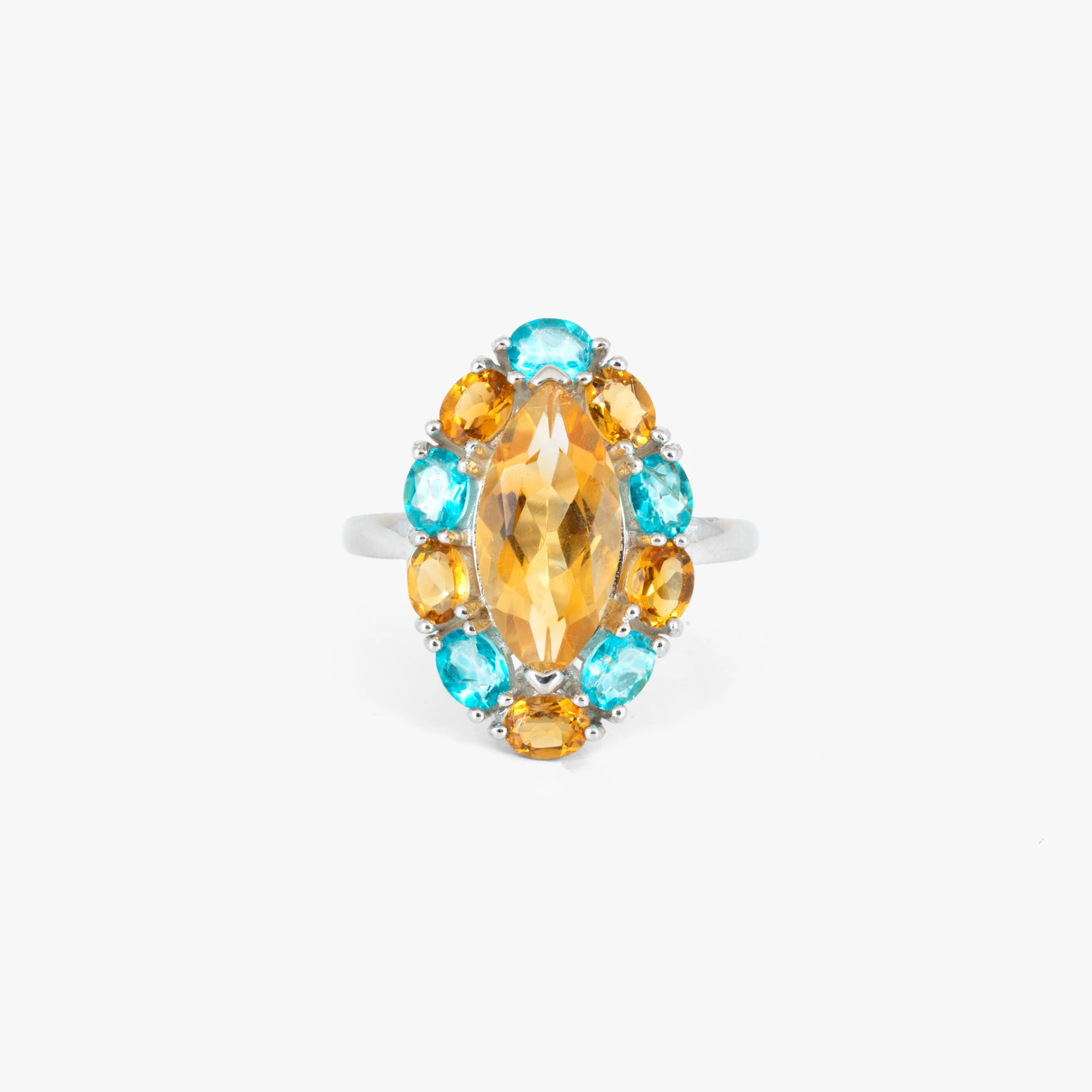 Silver ring decorated with topazes and citrine