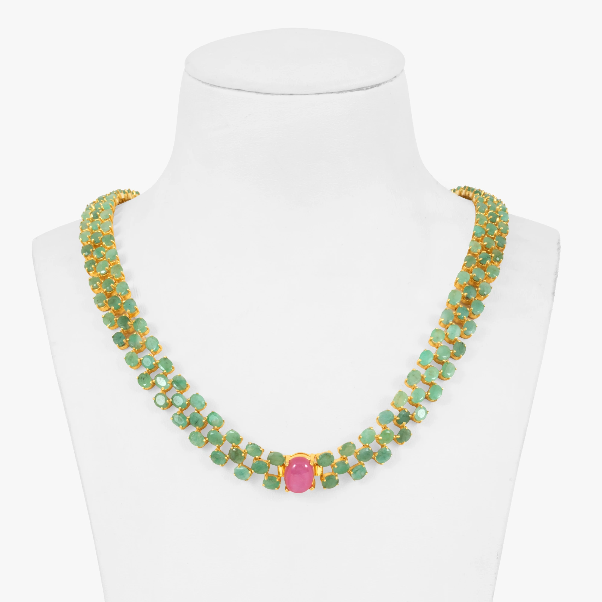 Gold-plated silver necklace, decorated with emeralds and a pink sapphire