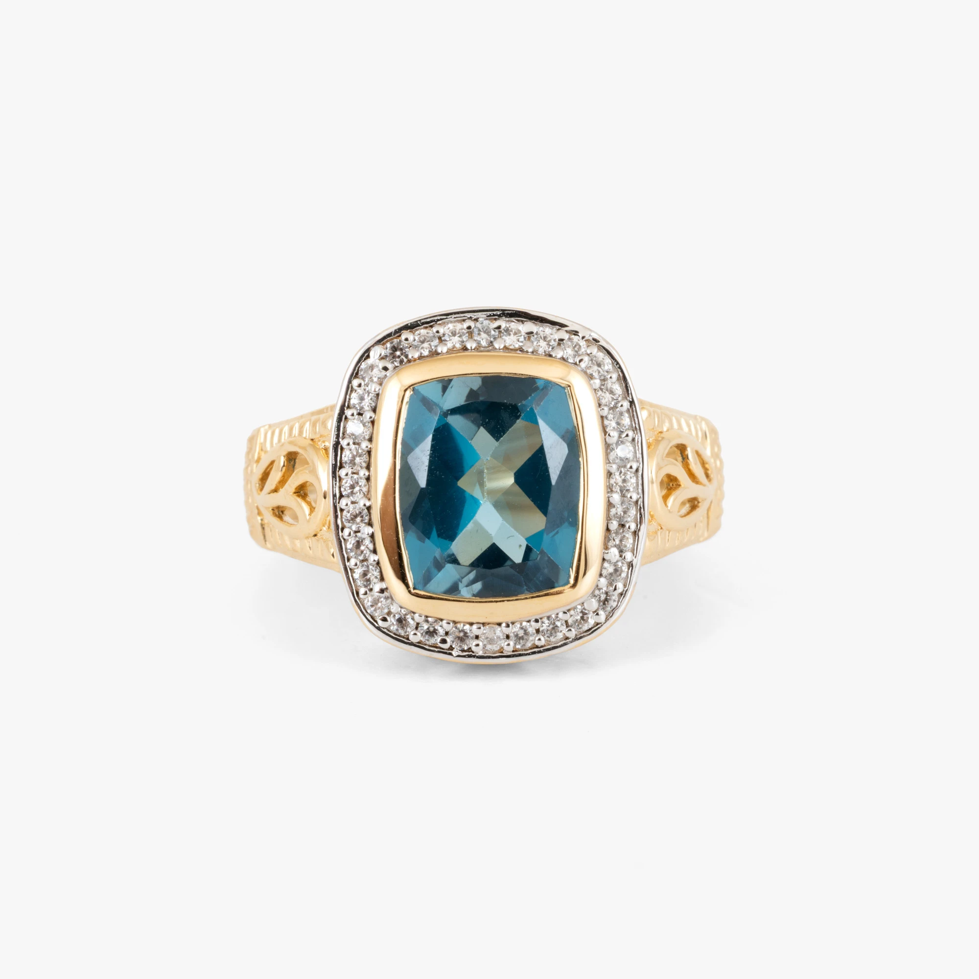 Inel din argint aurit, decorat cu topaz anturat de safire 