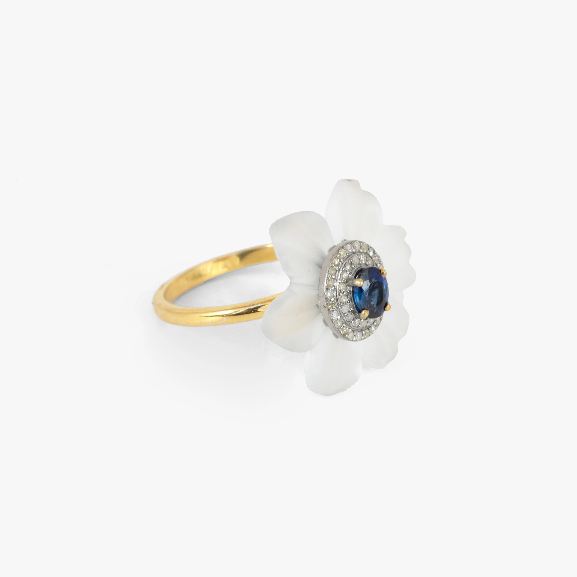 Silver ring with partial gold plating, decorated with rock crystal, sapphire, and diamonds