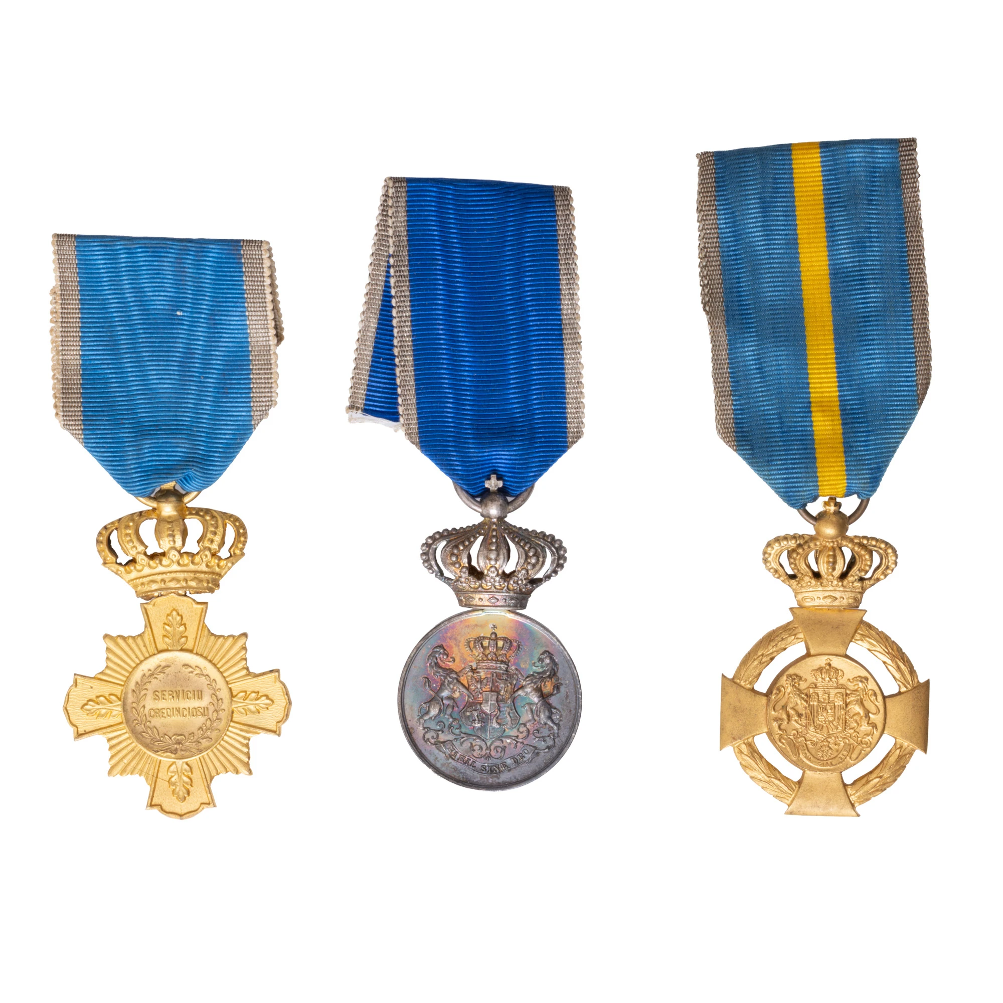 Lot format din trei decorații ”Serviciul Credincios”, model 1906 și 1932