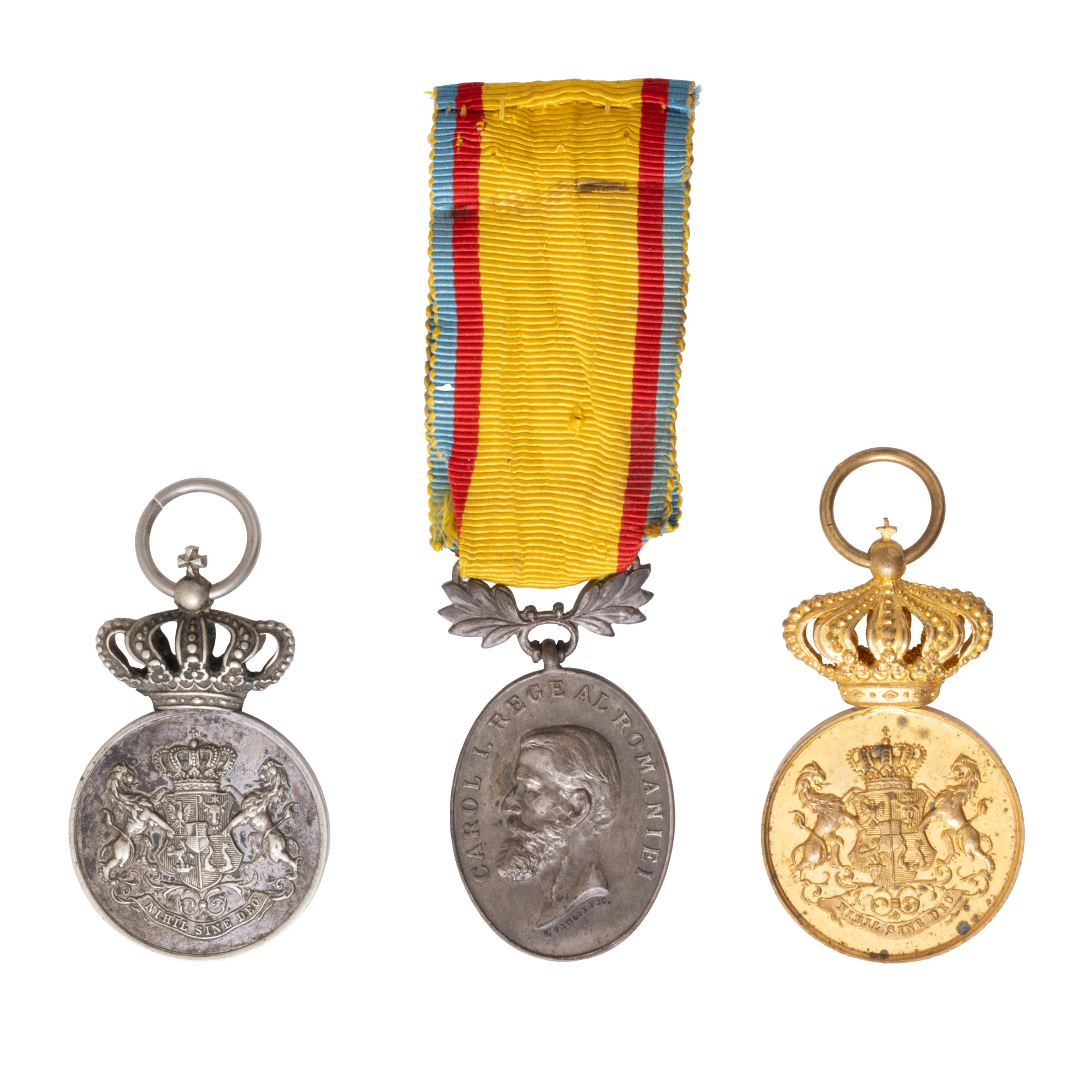 Lot format din două medalii ”Serviciul Credincios”, clasa I și II, model 1878, și medalia ”Bărbăție și Credință”, gravori F. Pawlik și Resch, cca. 1913