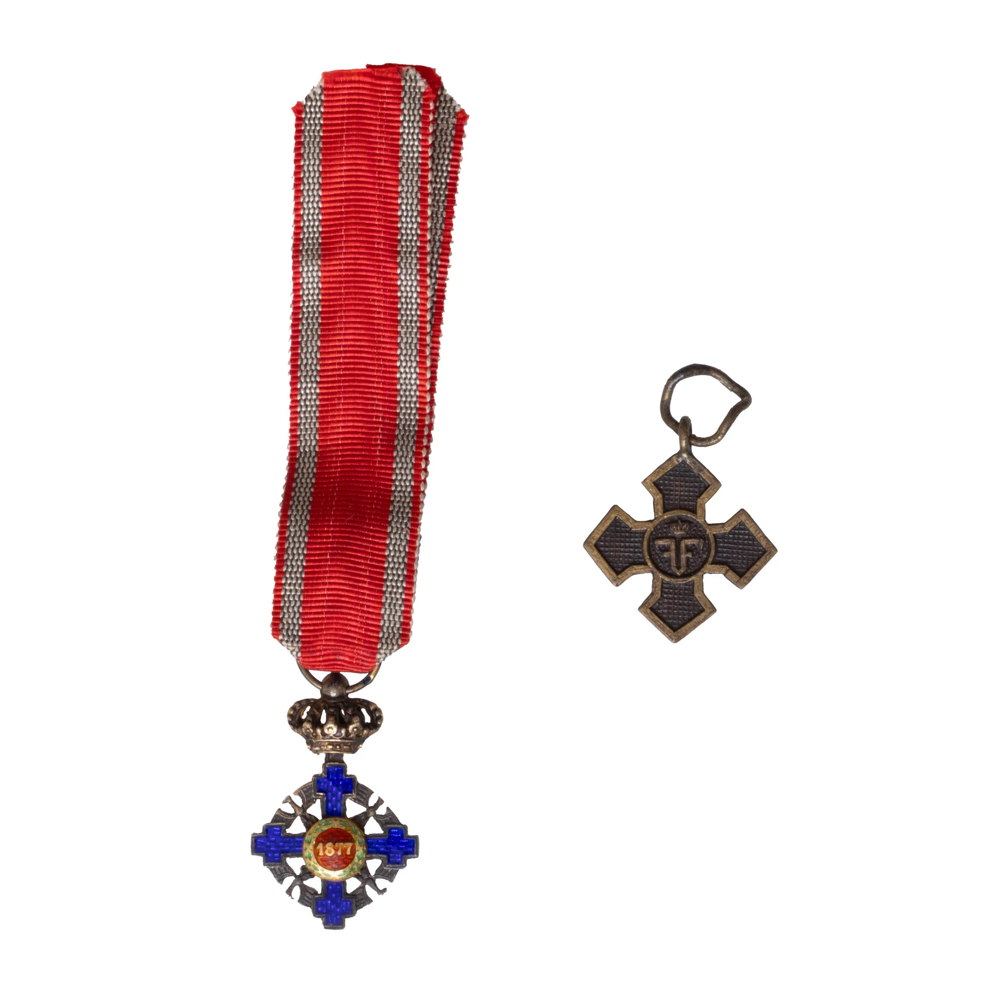 Lot format din miniatura Ordinului ”Steaua României”, în grad de cavaler, pentru civili, 1932, și miniatura ”Crucea Comemorativă a Primului Război Mondial”, 1918