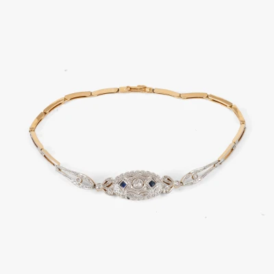 Brățară în stil  Art Deco din aur bicolor, decorată cu diamante și pietre ornamentale, însoțită de certificat gemologic suplimentar