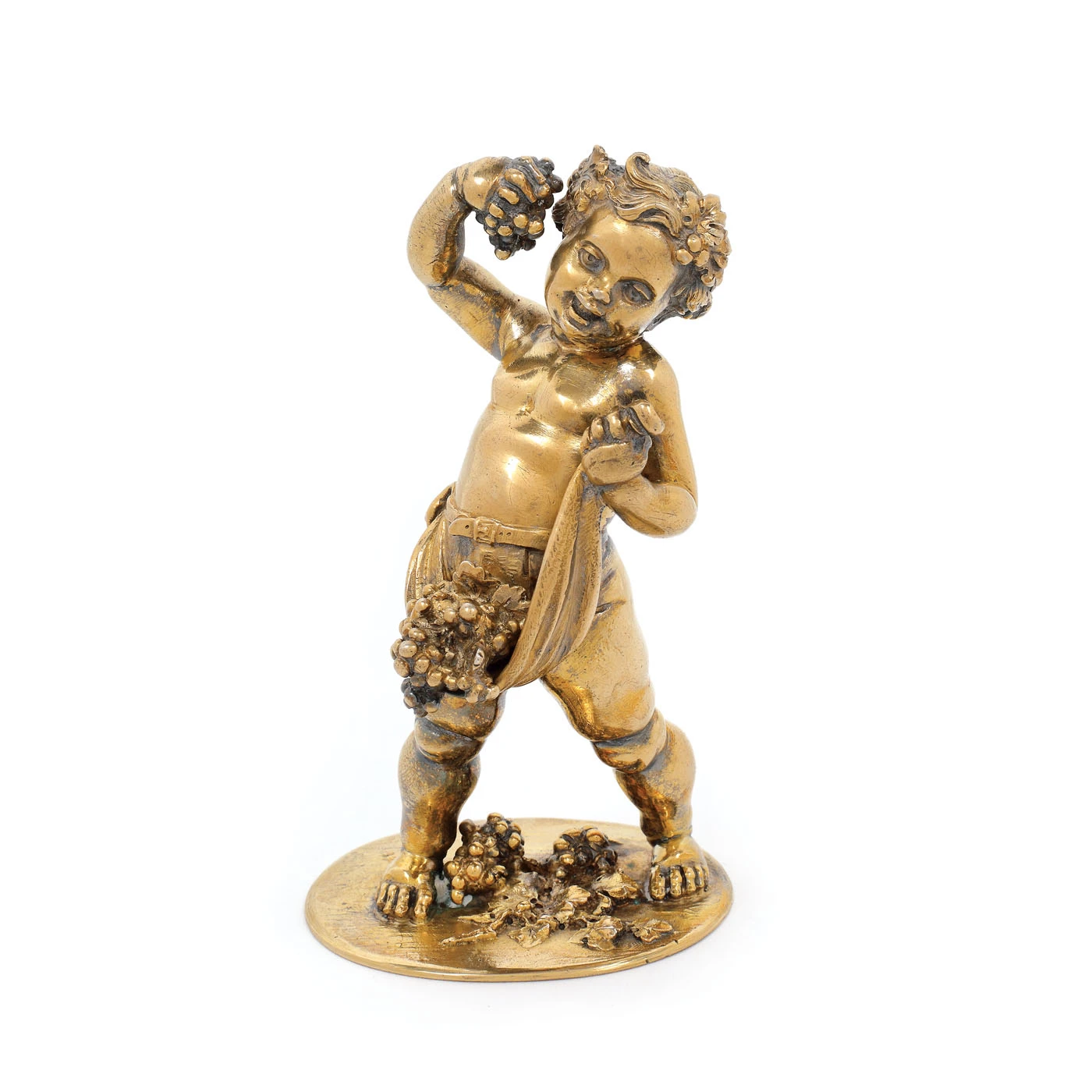 Statuetă decorativă din argint aurit, în forma unui putto culegător de struguri