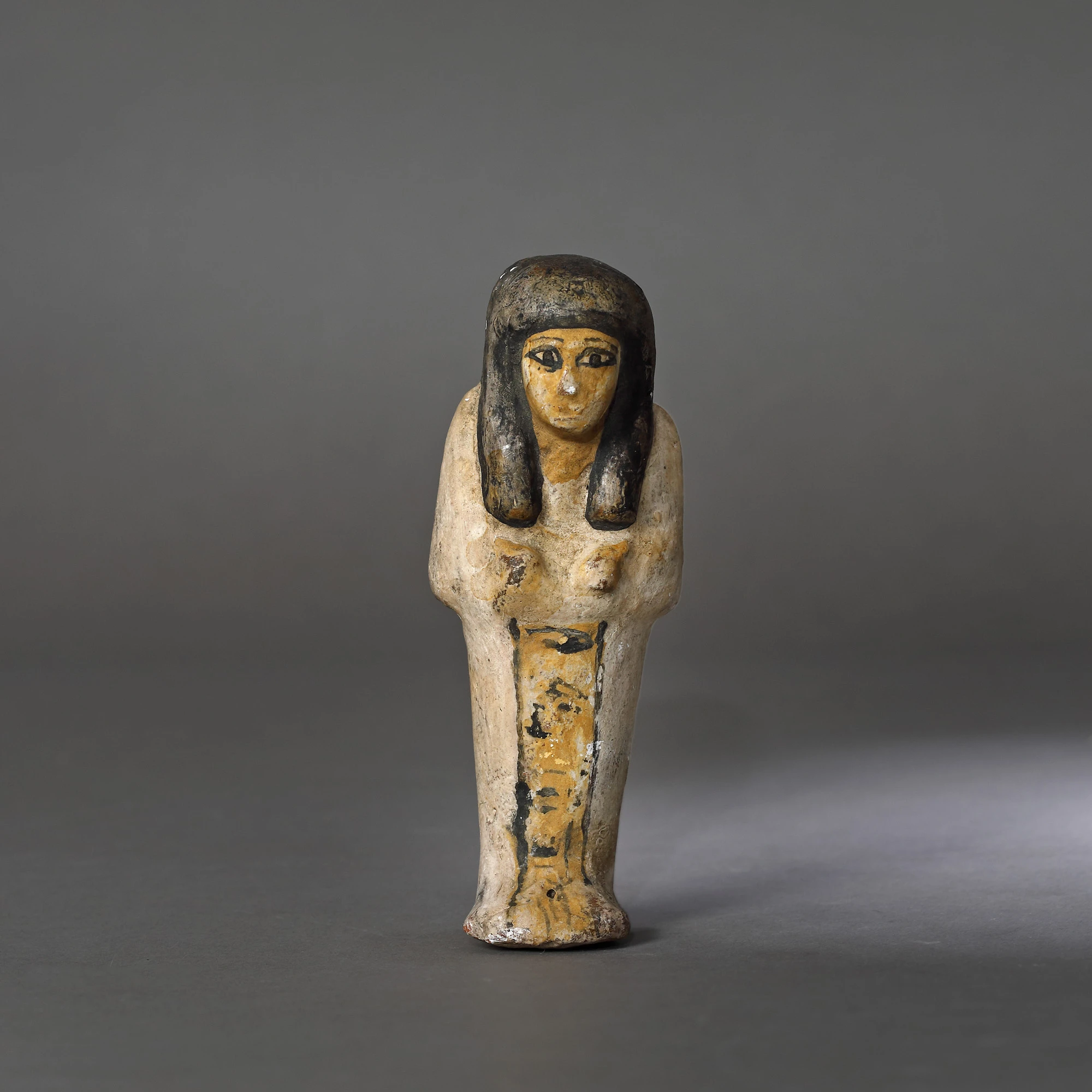 Egyptian painted ceramic statuette, representing a maid for the afterlife, probably the Late Dynastic Period, 6th-5th century B.C.