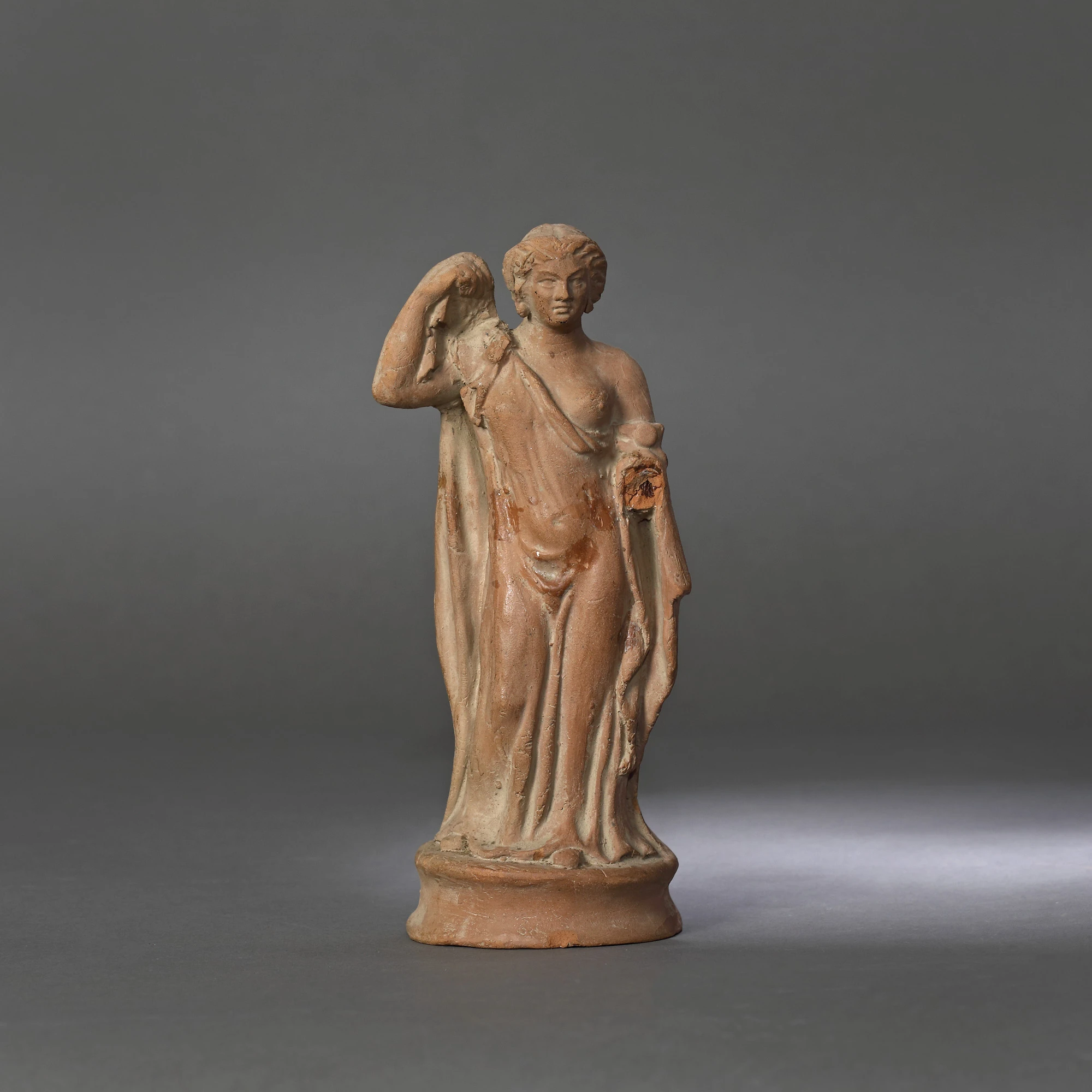 Burnt clay statuette, Tanagra type, representing Aphrodite, the goddess of beauty, 2nd-1st century B.C.
