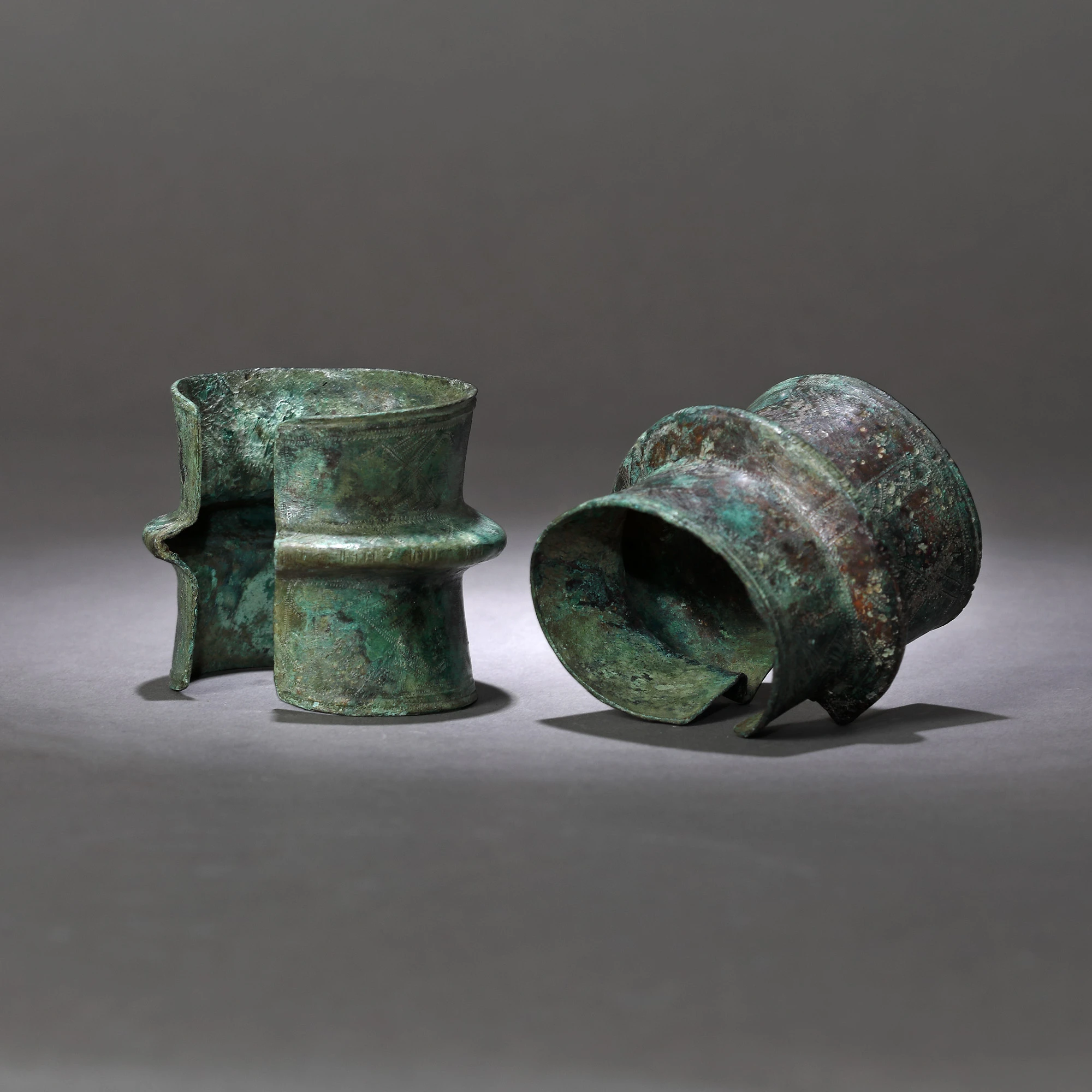 Two bronze bracelets, engraved with geometric motifs, North-eastern Europe, possibly Poland, 8th-10th century