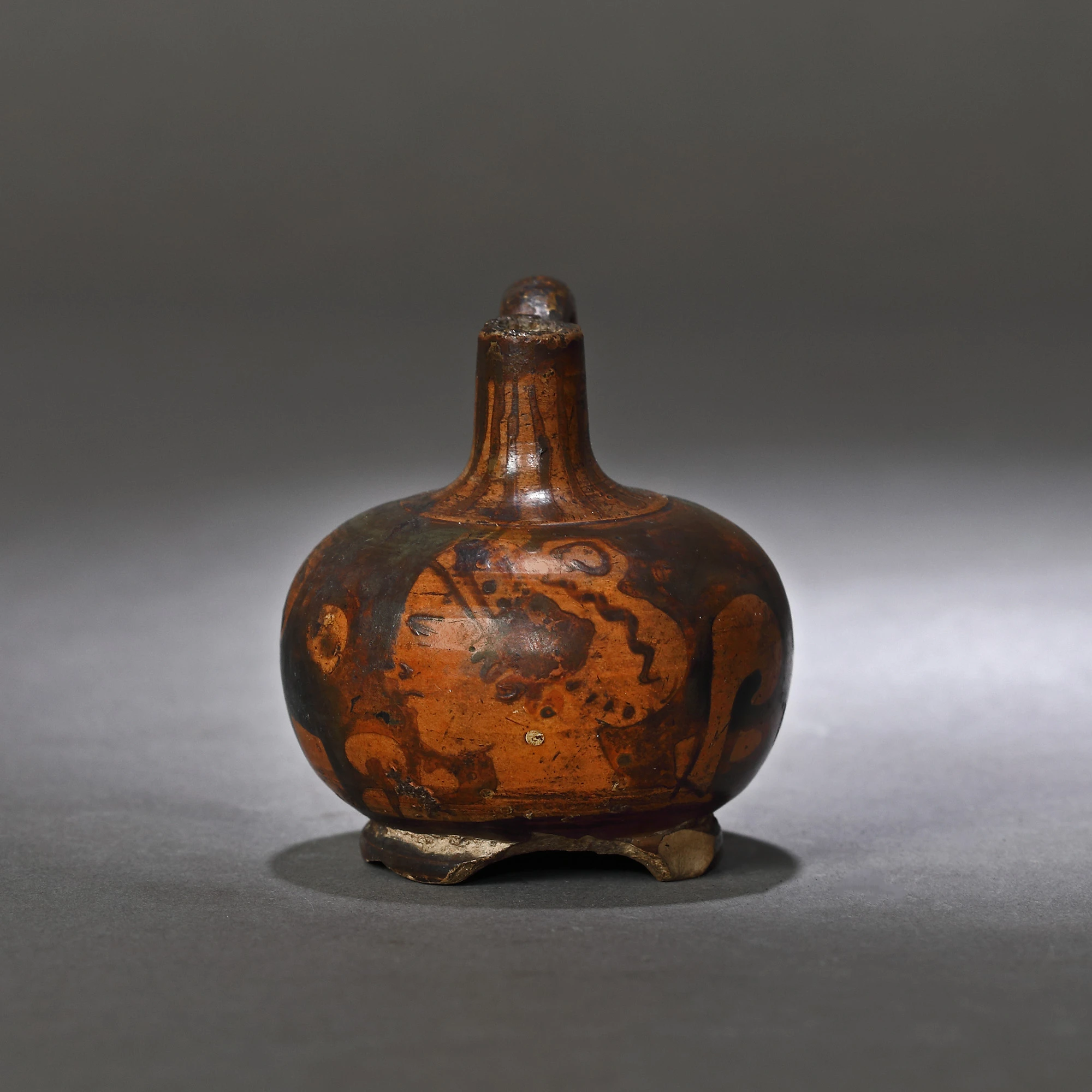 Painted ceramic vessel, black-figure style, depicting the face of a woman in profile, along with some plant motifs, the colonial period, Asia Minor, 6th century B.C.