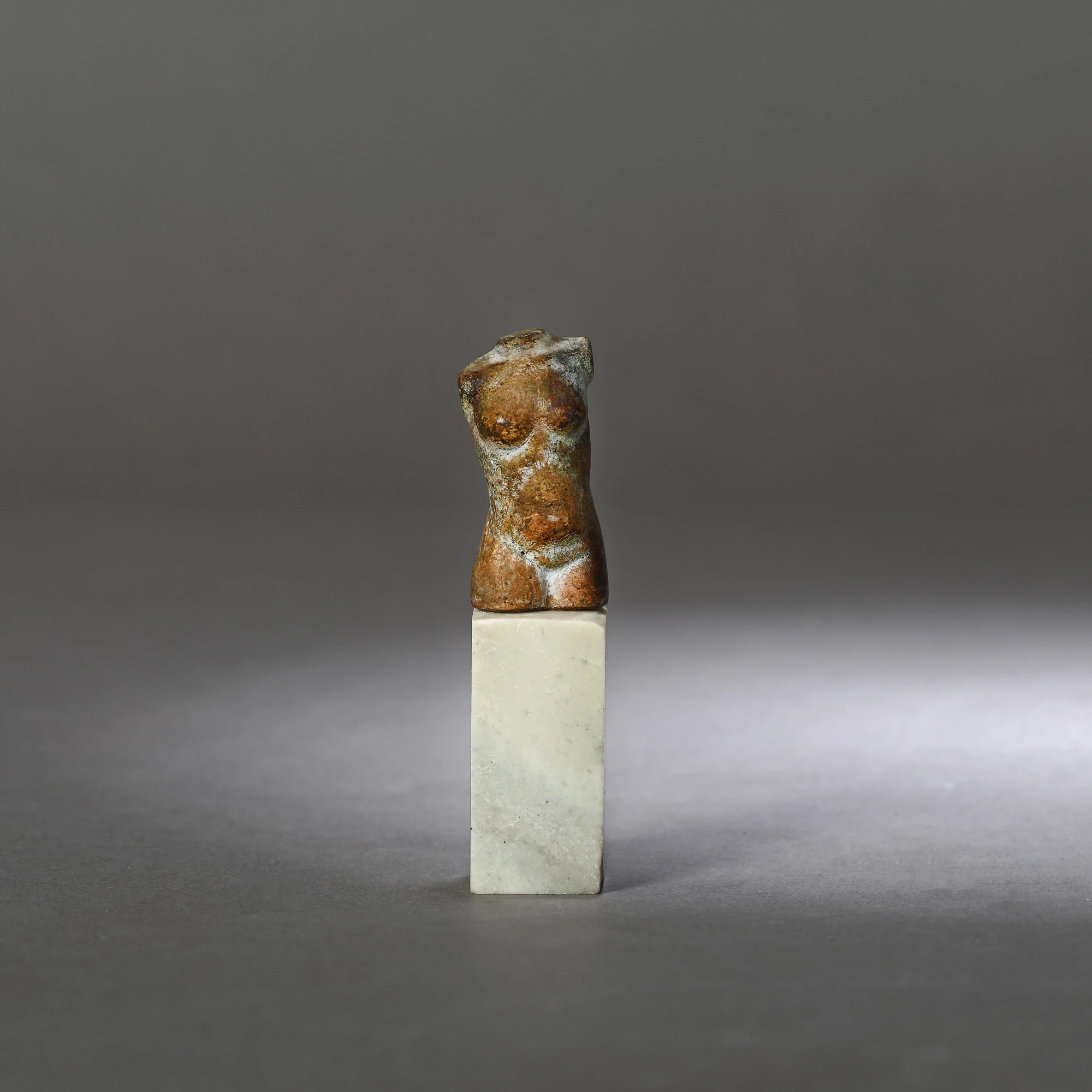 Miniature stone statuette, representing a torso of the goddess Venus, the goddess of beauty, possibly 4th century-V