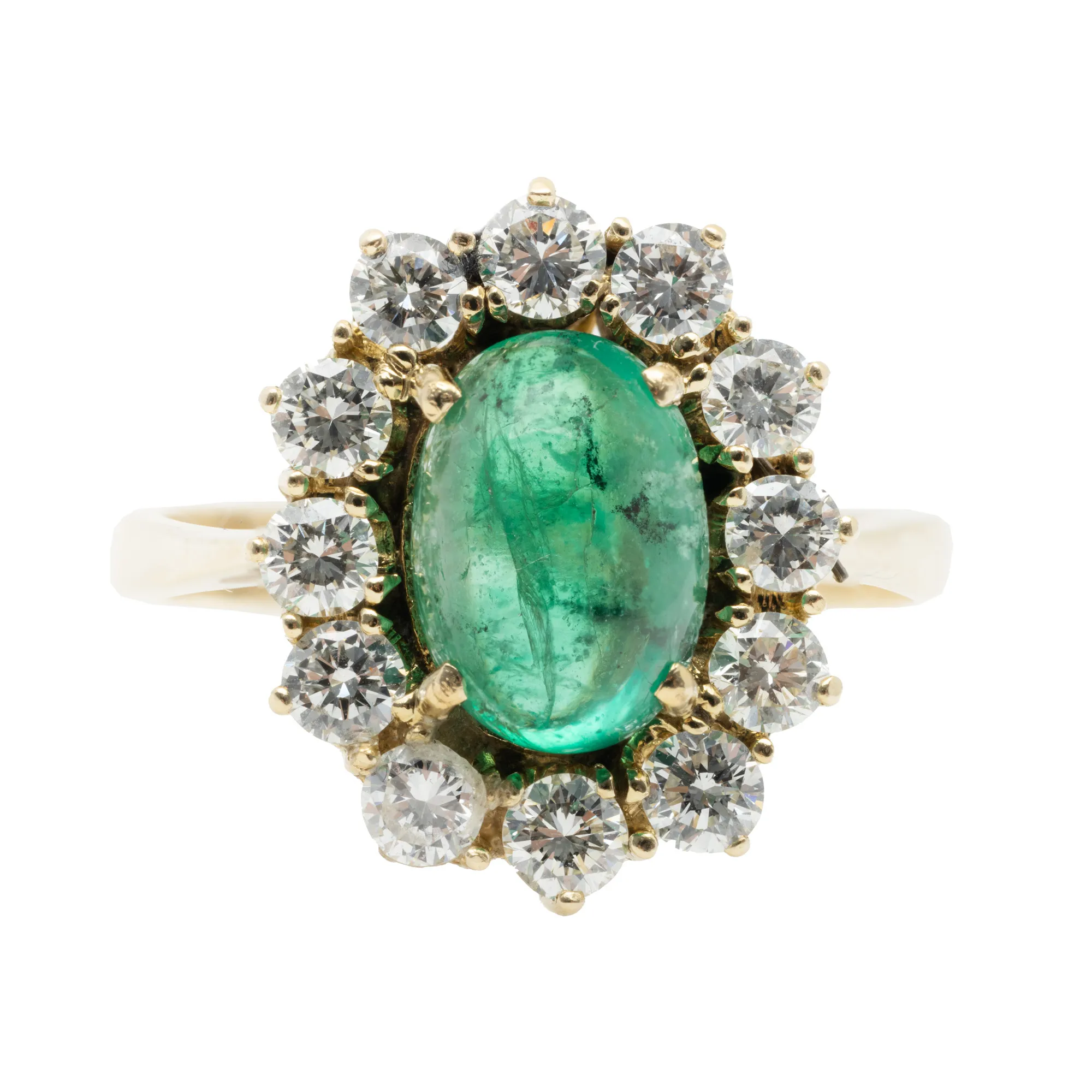 Gold ring, decorated with diamonds and emerald