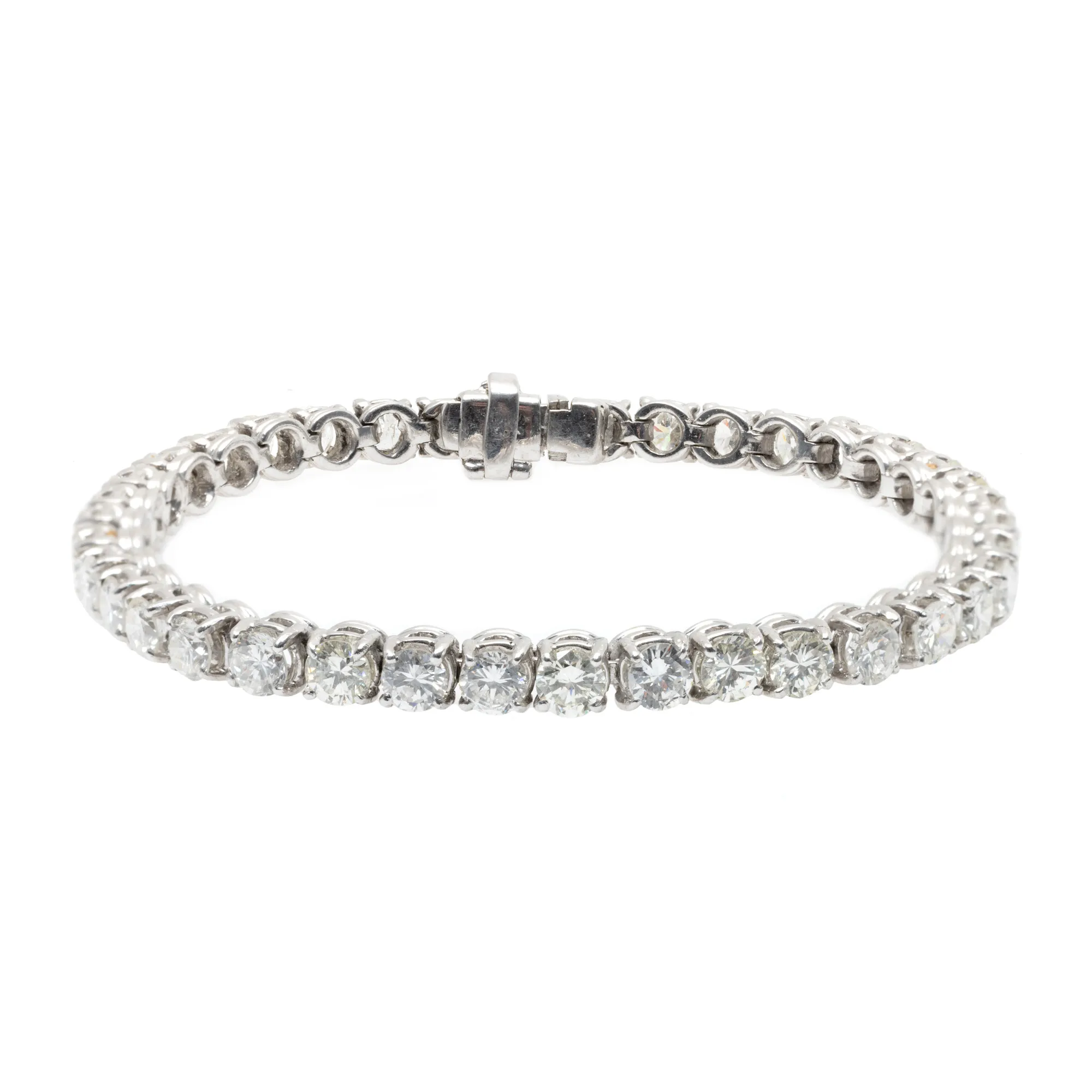 White gold tennis bracelet, decorated with approximately 9.30 ct. diamonds.