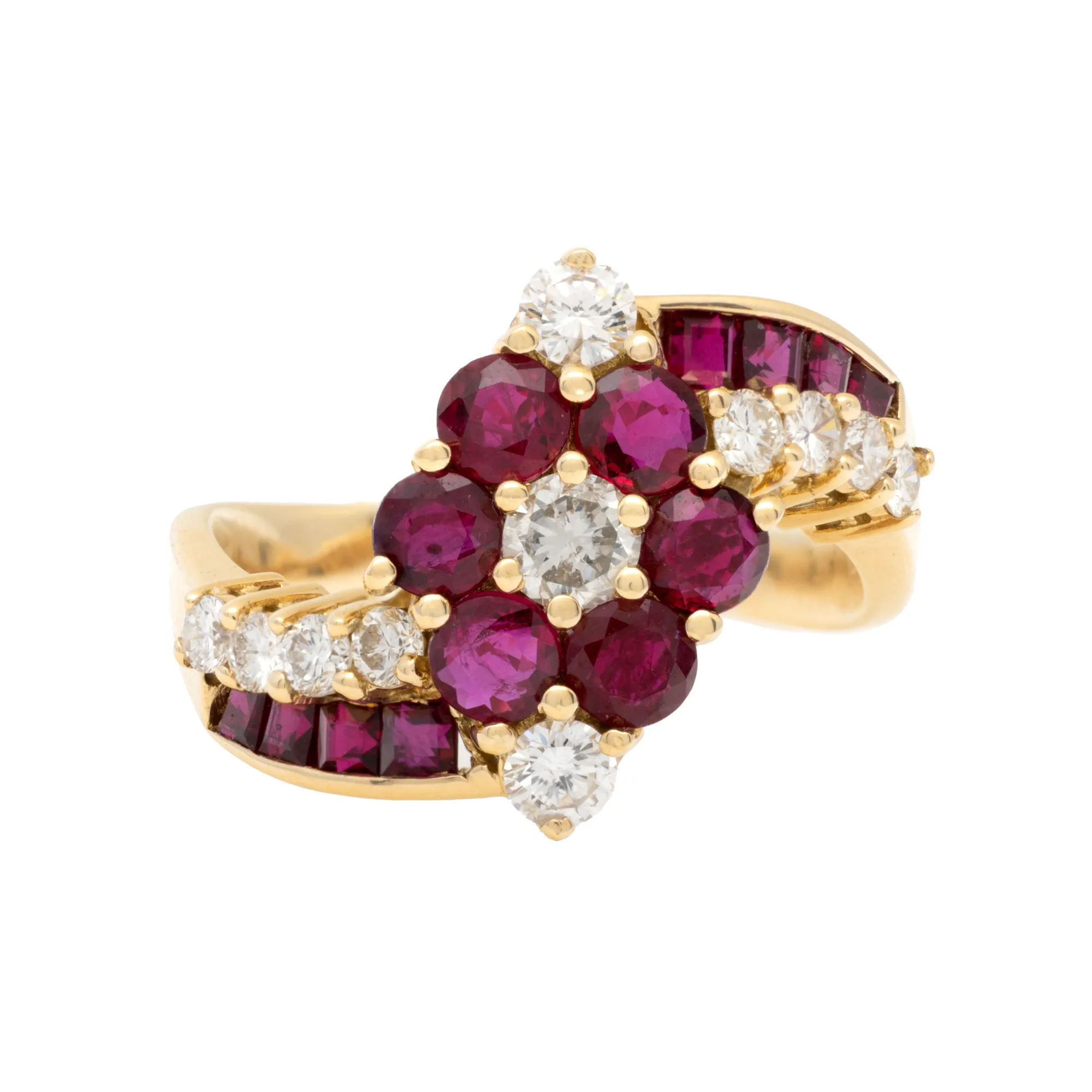 Gold ring, adorned with diamonds and rubies arranged in a floral pattern