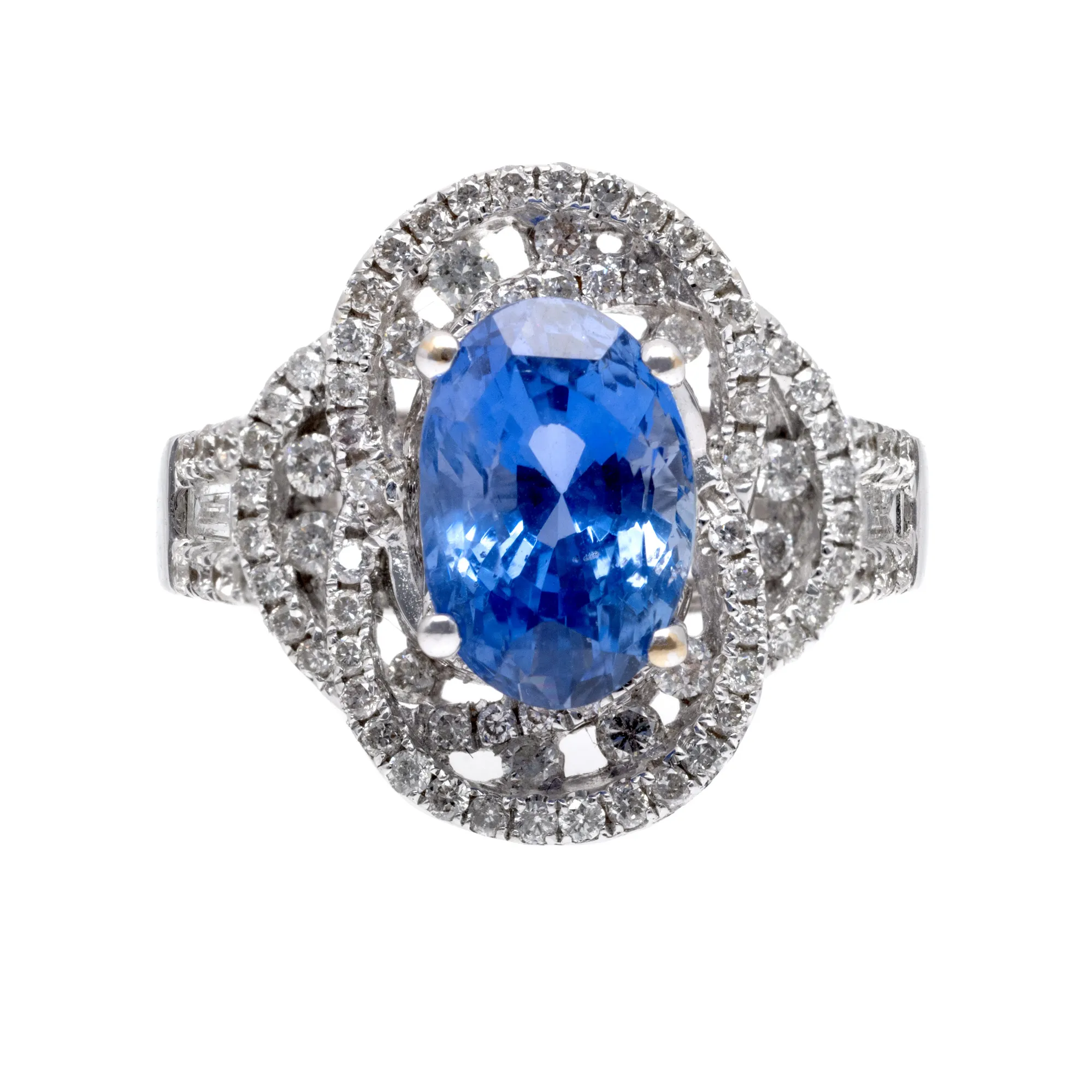 White gold ring, centrally decorated with sapphire, surrounded by diamonds, accompanied by IGS gemological certificate