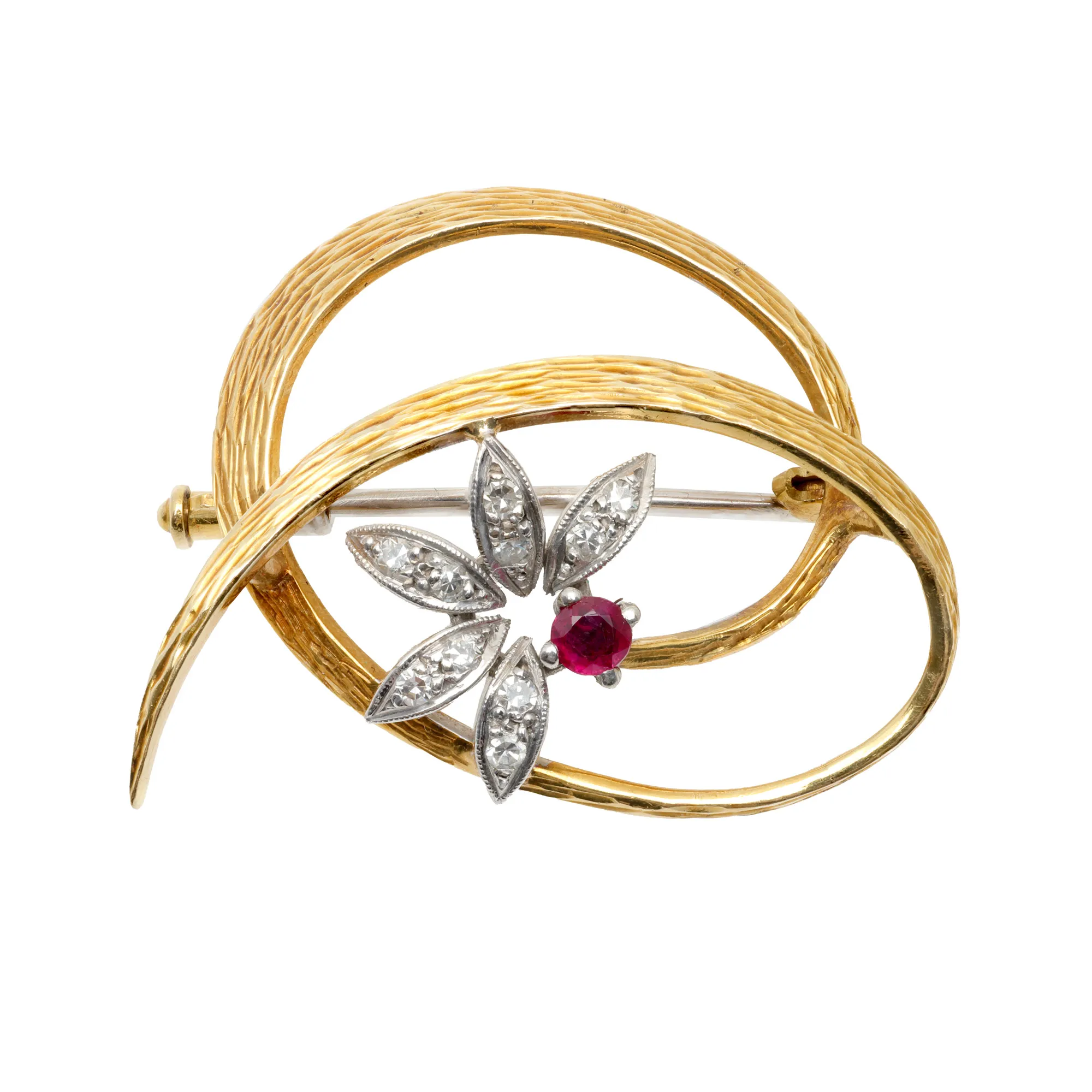 Bicolor gold brooch decorated with rubies and diamonds