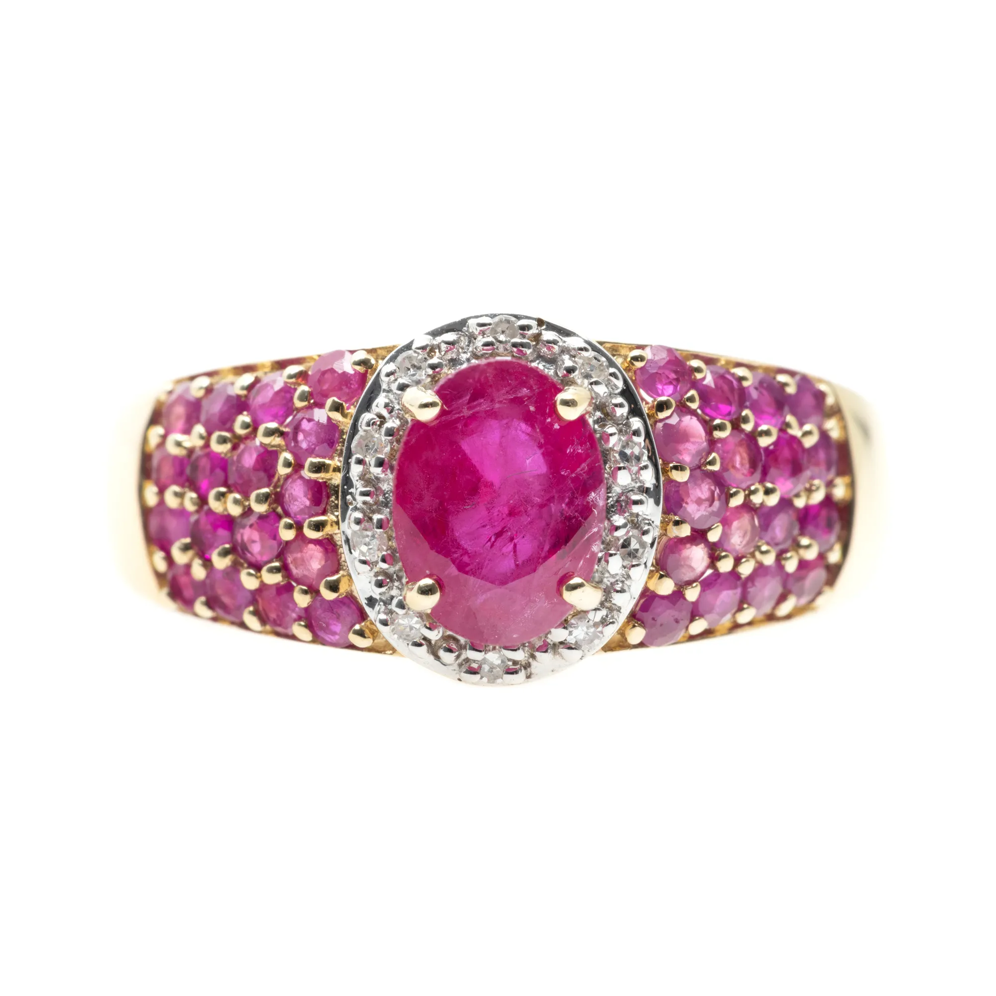 Gold ring decorated with rubies and diamonds