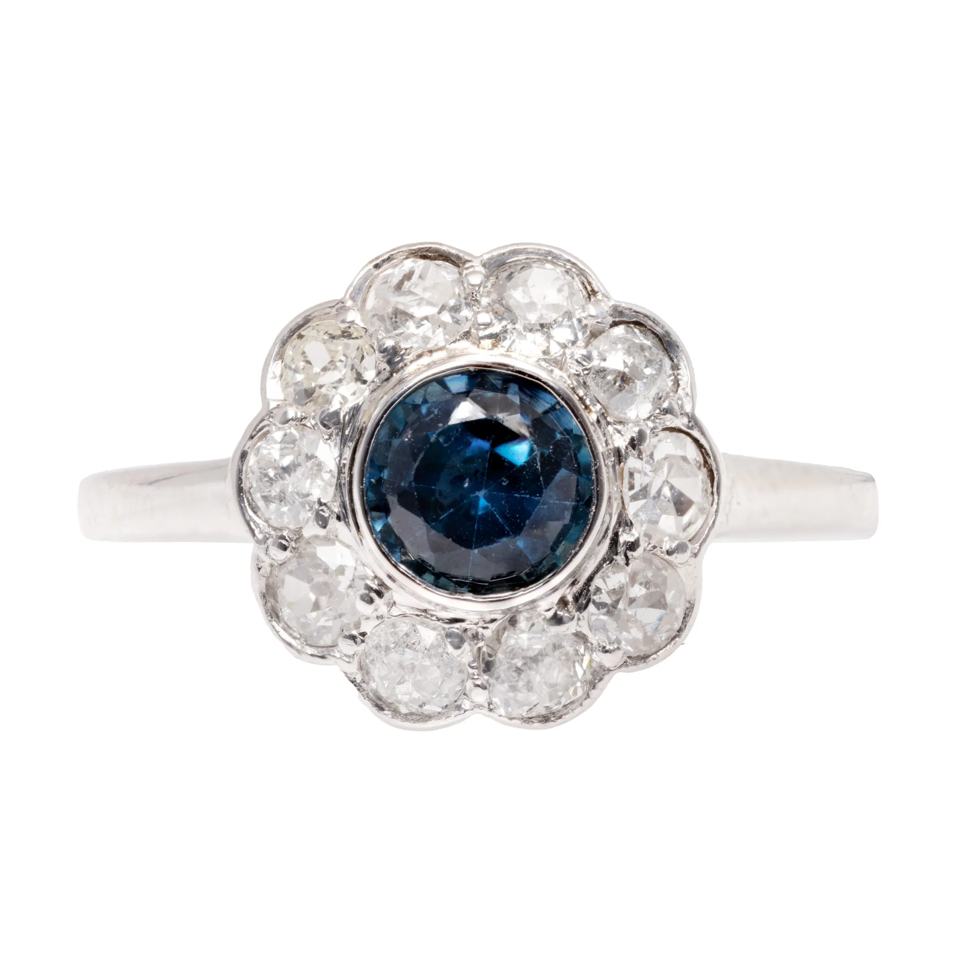White Gold Ring, decorated with central sapphire, surrounded by diamonds