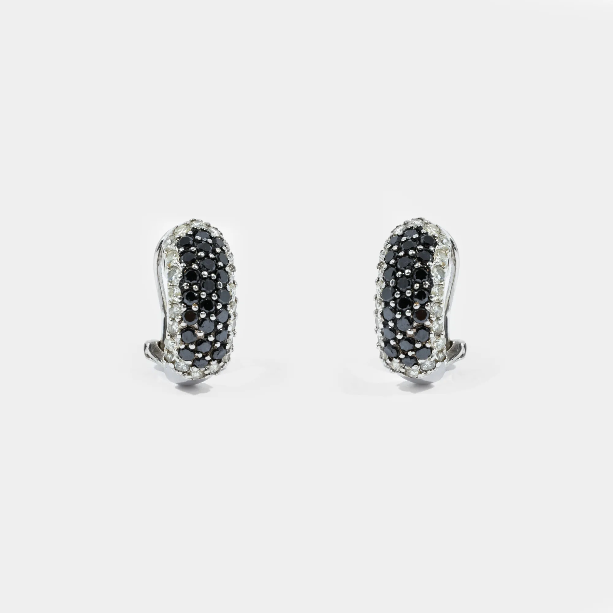 Pair of white gold earrings, decorated with white and black diamonds