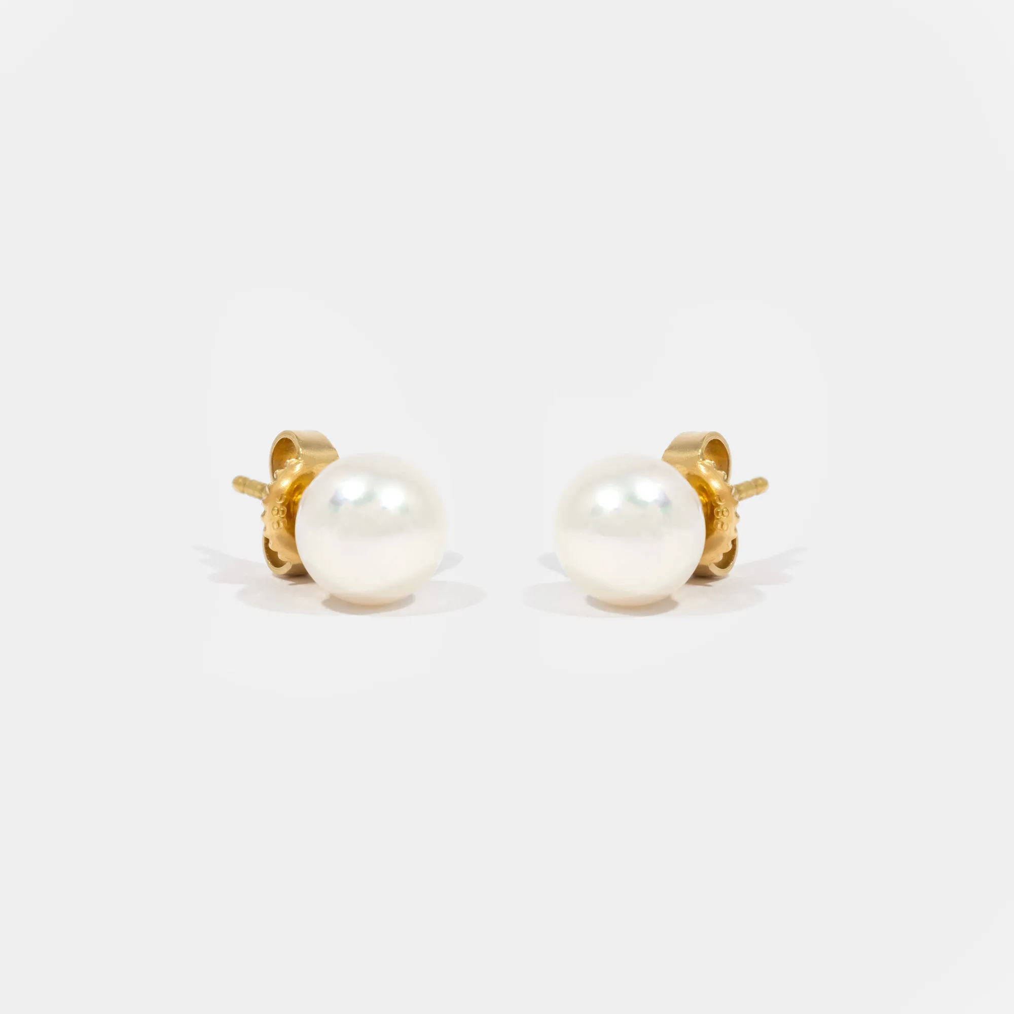 Mikimoto pair of gold earrings, decorated with Akoya pearls, in the original box