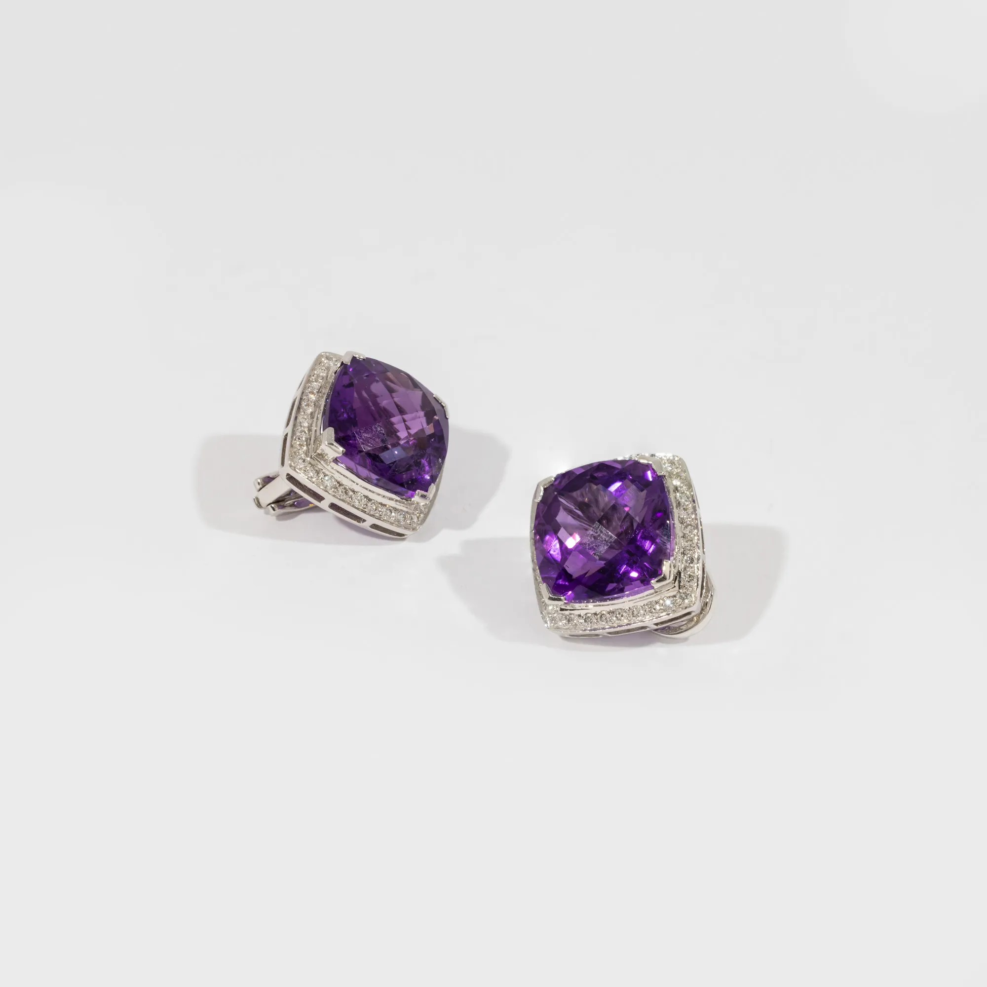 Pair of white gold earrings, decorated with amethysts and diamonds