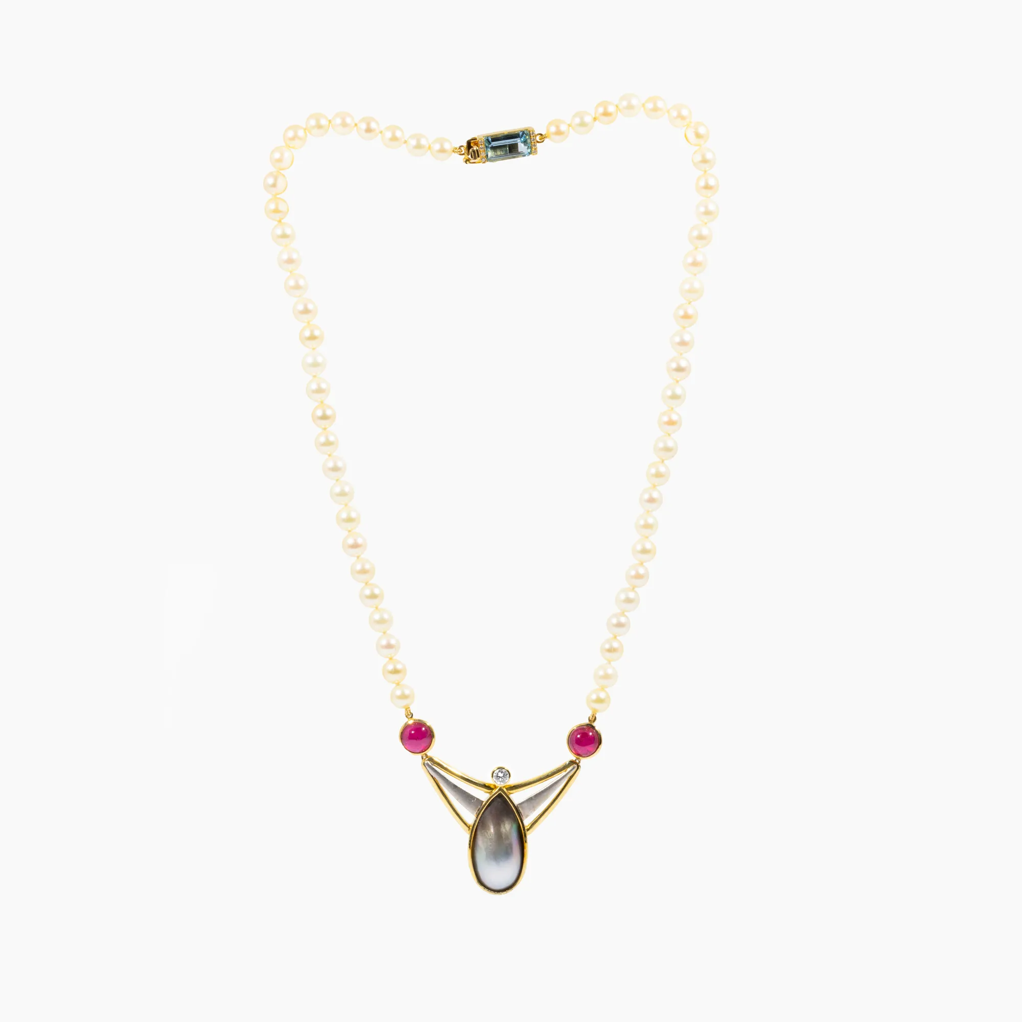 Pearl necklace, decorated with diamond, aquamarine, mother-of-pearl and cabochon rubies