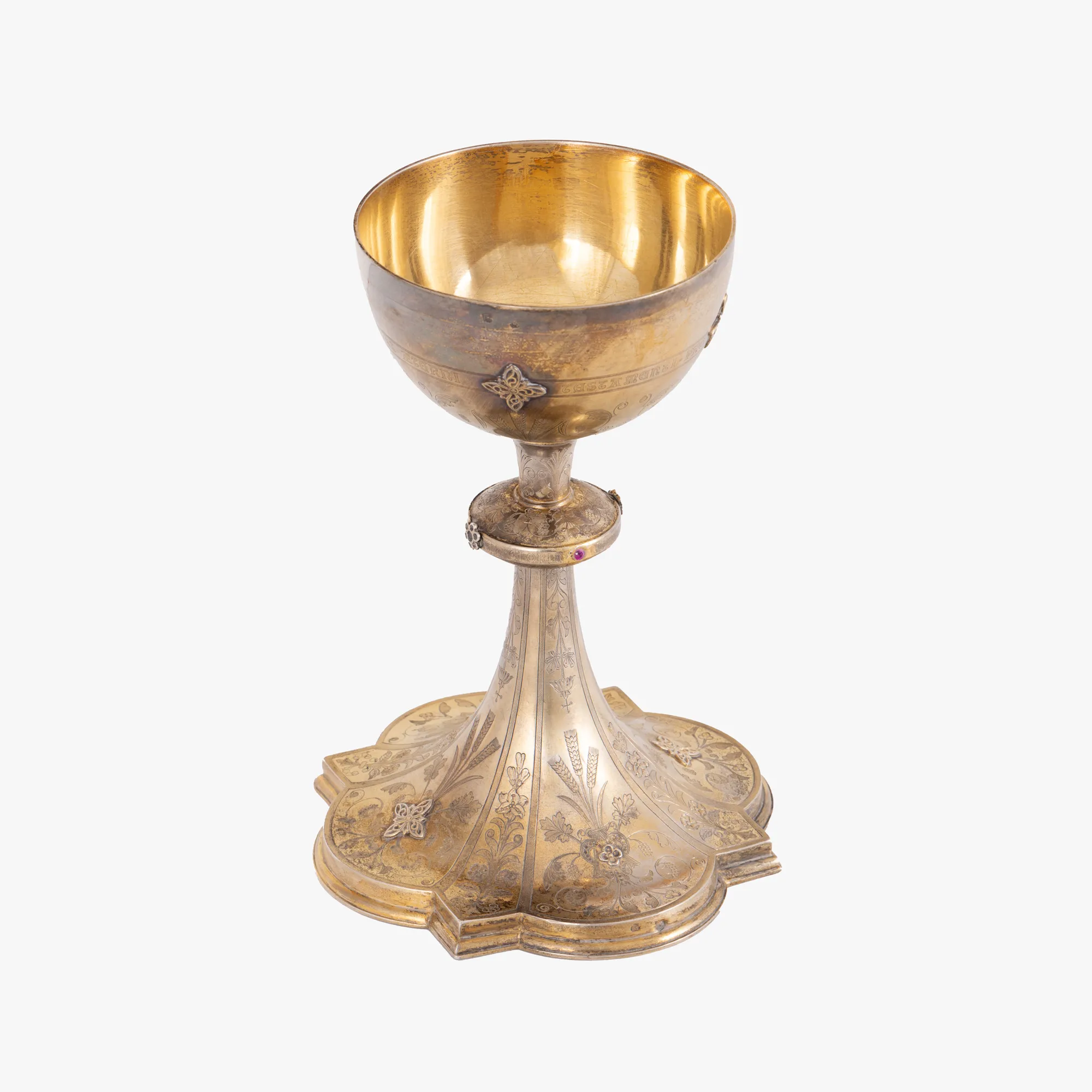 Partially gilded silver church goblet, decorated with botanical elements and dedication "J.R. May 27, 1893"