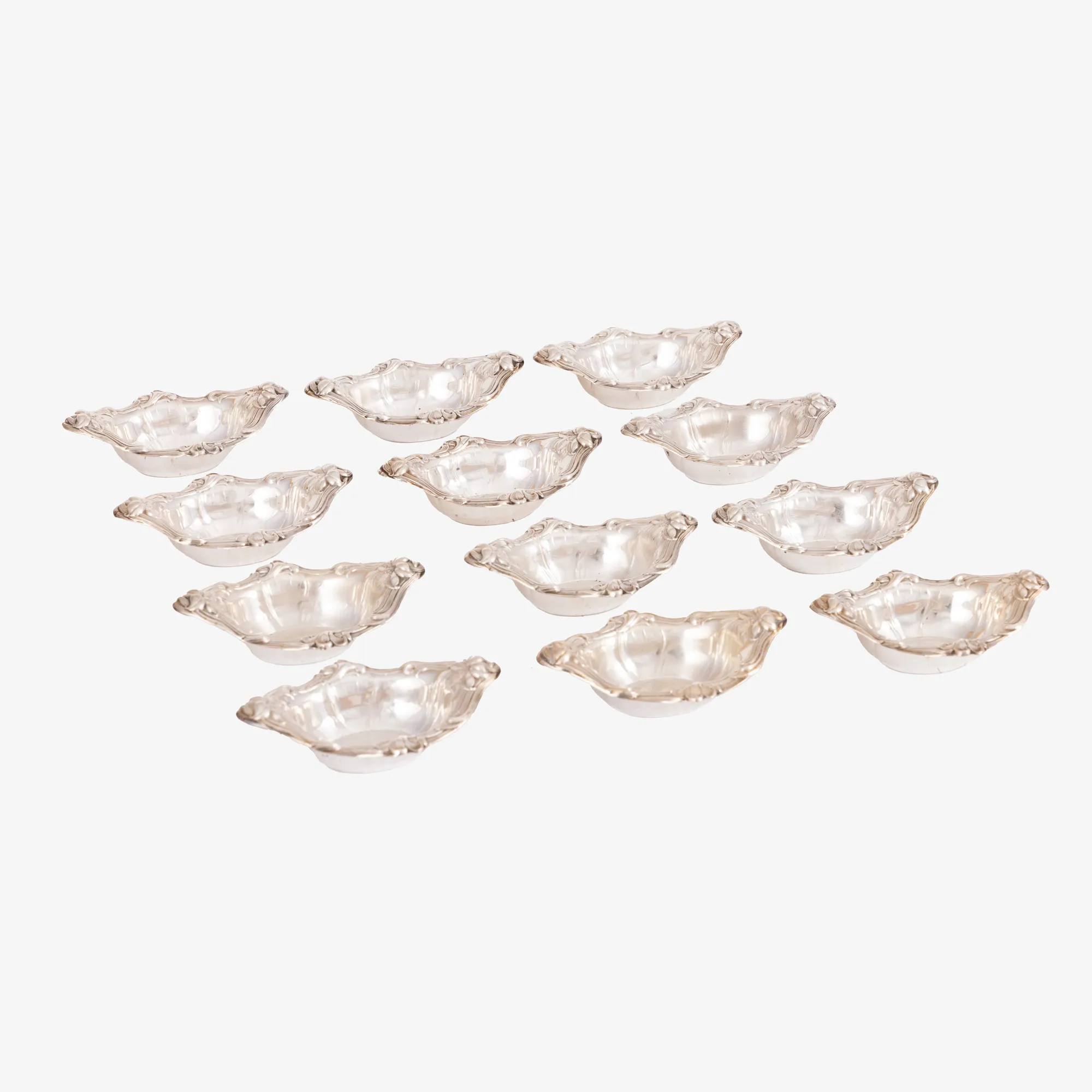 Art Nouveau set, of 12 silver saucers, for caviar, J.E. Caldwell & Co workshop, ca. 1900