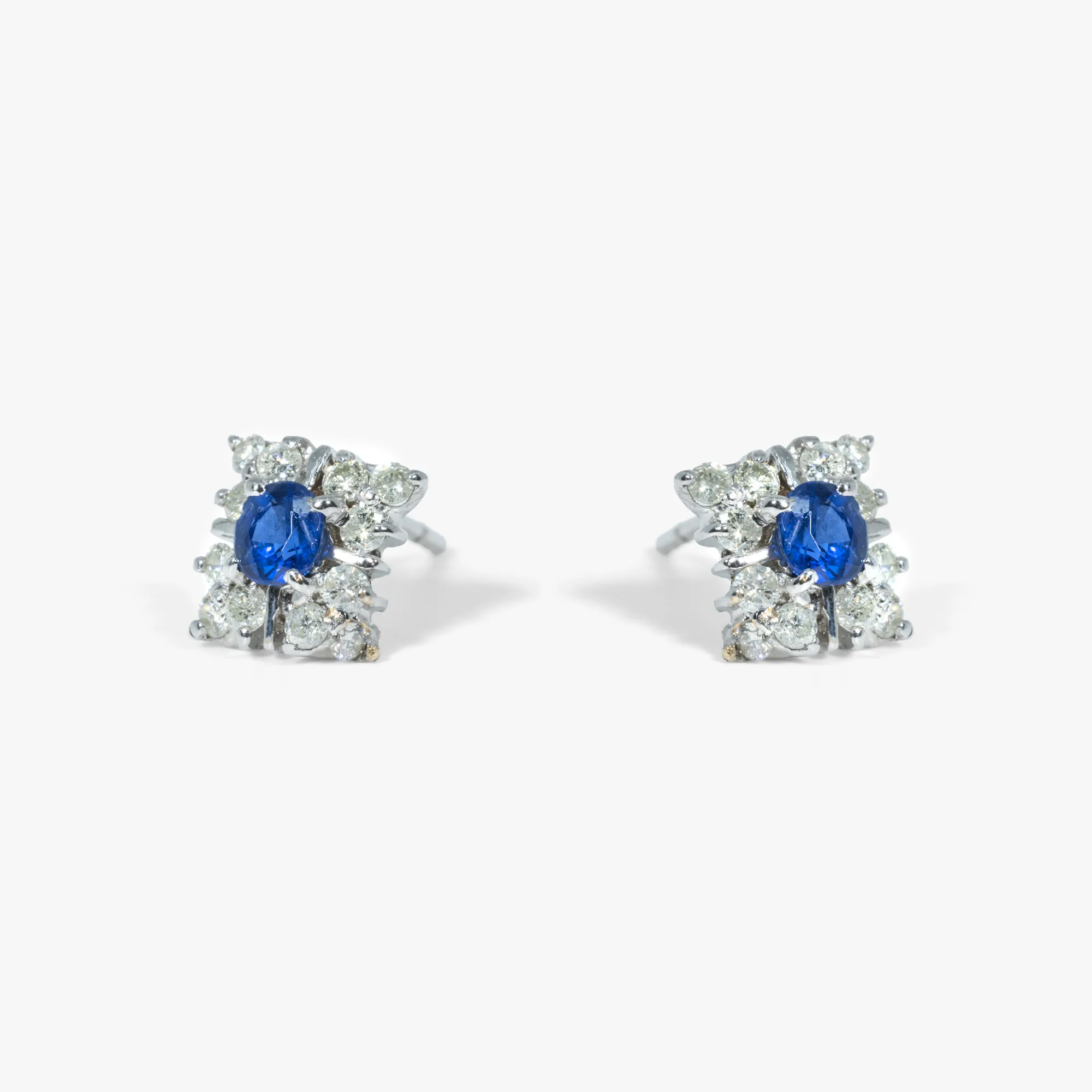 Pair of white gold earrings, decorated with diamonds and sapphires