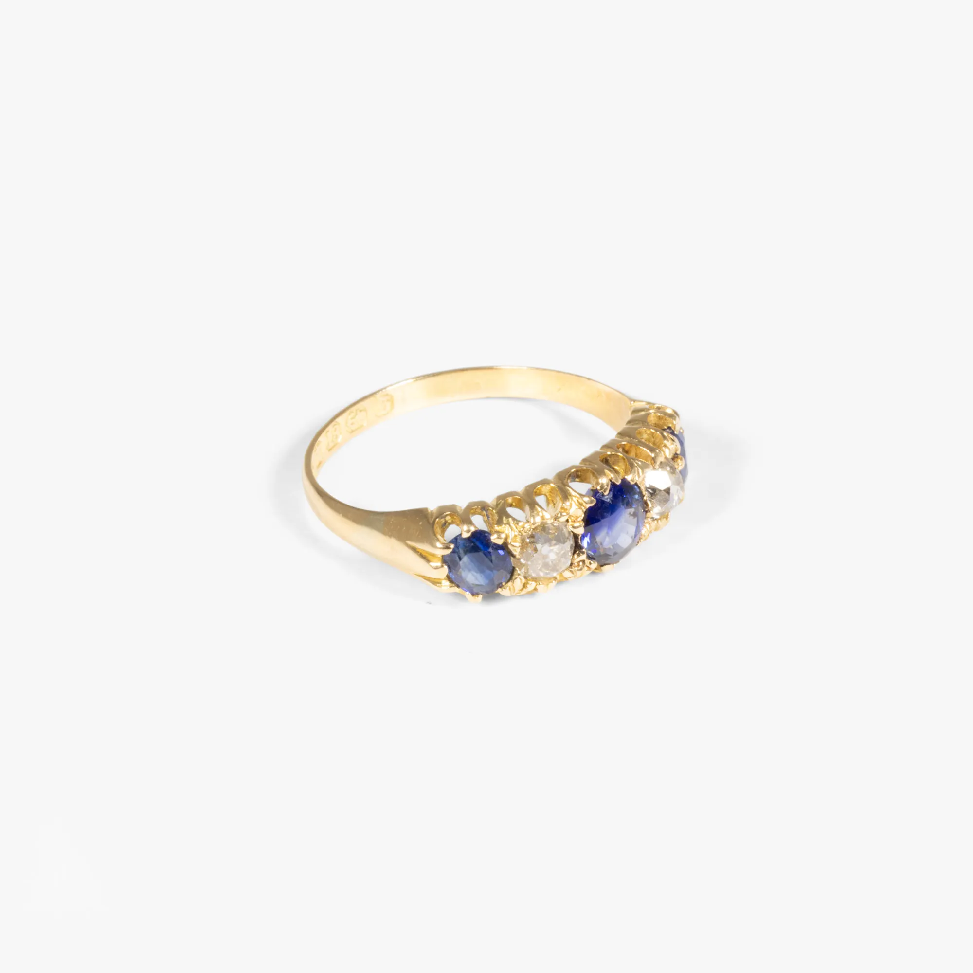 Gold ring, adorned with sapphires and diamonds