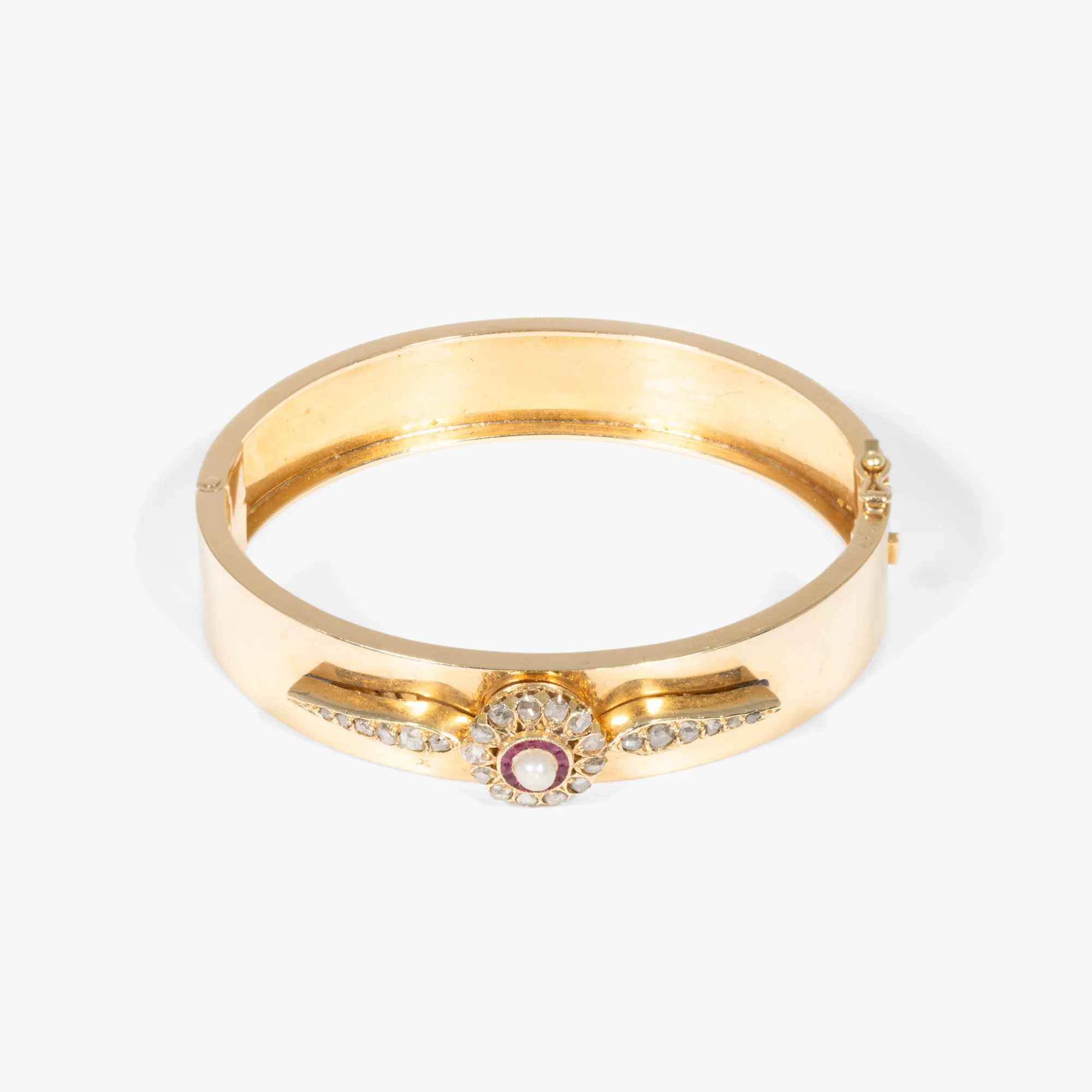 Gold bracelet, adorned with diamonds and rubies, circa 1930