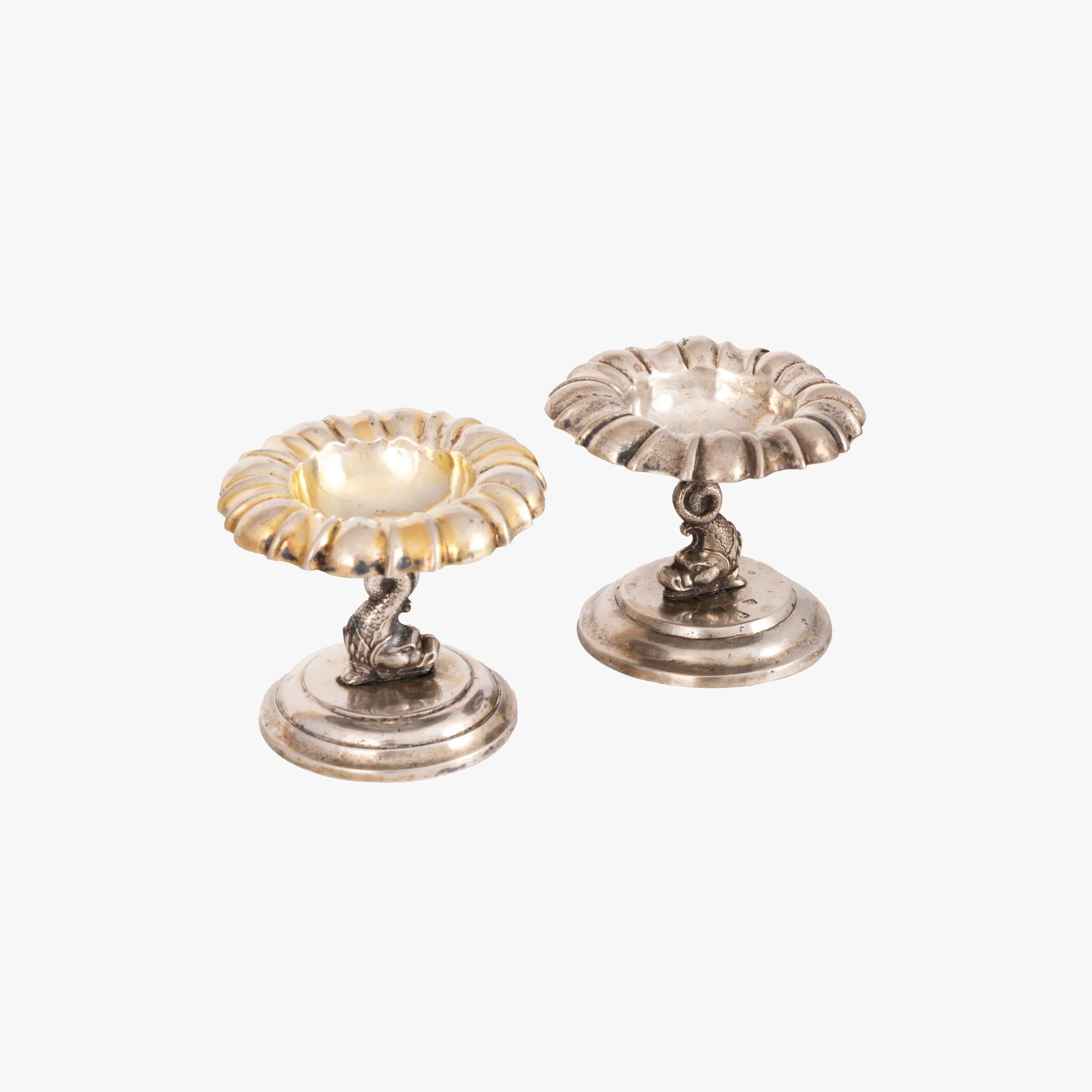 Pair of silver salt shakers, decorated with stylized dolphins, cca. 1870